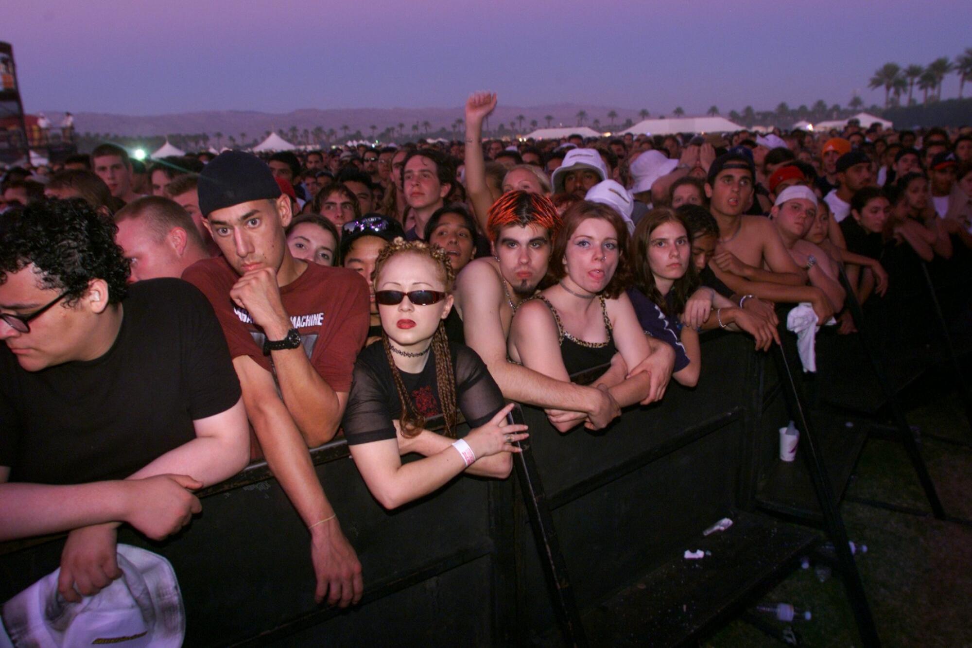 Thousands of fans against the barricade at the first Coachella 