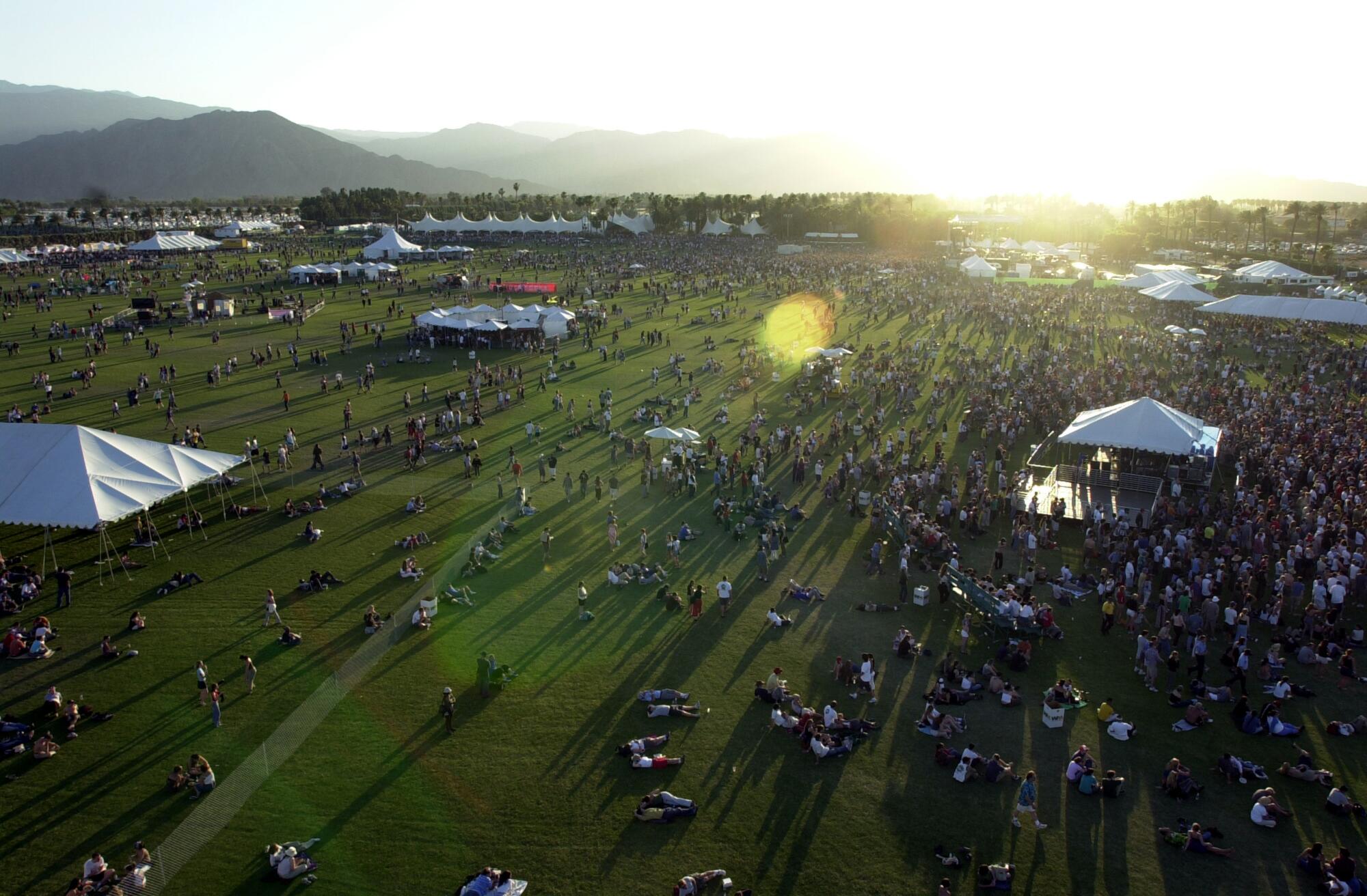 Looking at the field of Coachella with thousands of fans on it from above