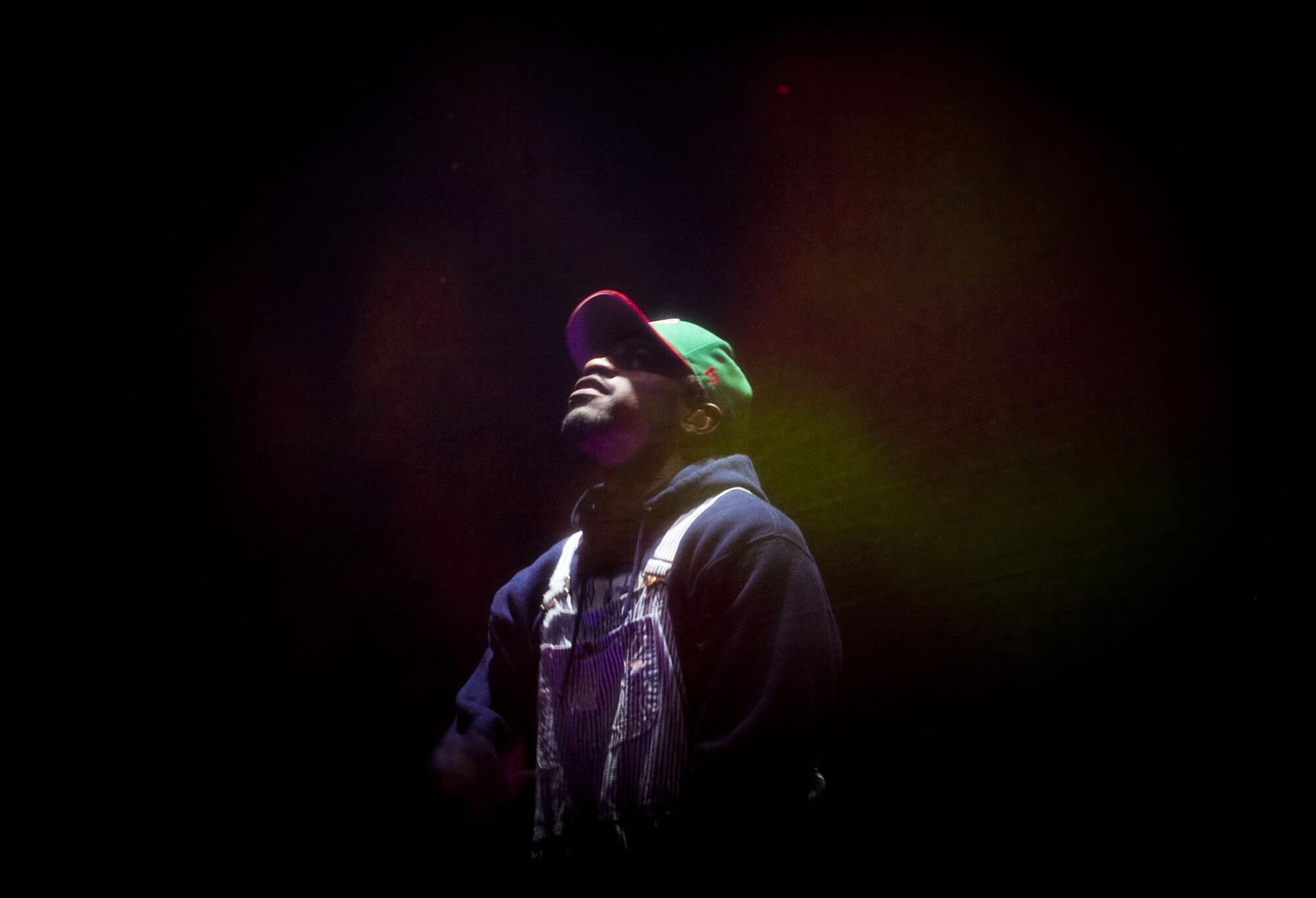 Andre 3000 of Outkast performs inside a screen box