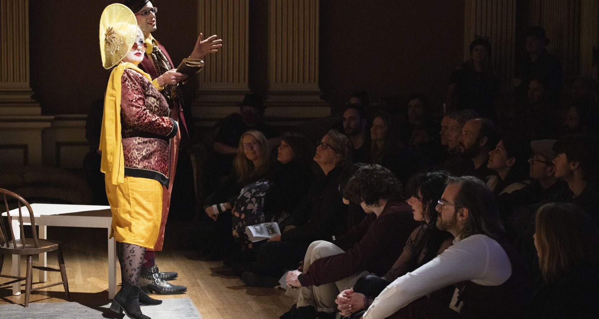 Nick Dickson performs the role of the ghost of Tim Finnegan (center) as audience members look on during a performance of 13th Floor Theater’s immersive play “Finnegan’s Wake: An Immersive Irish Ghost Story” on Thursday, April 2, 2026. 