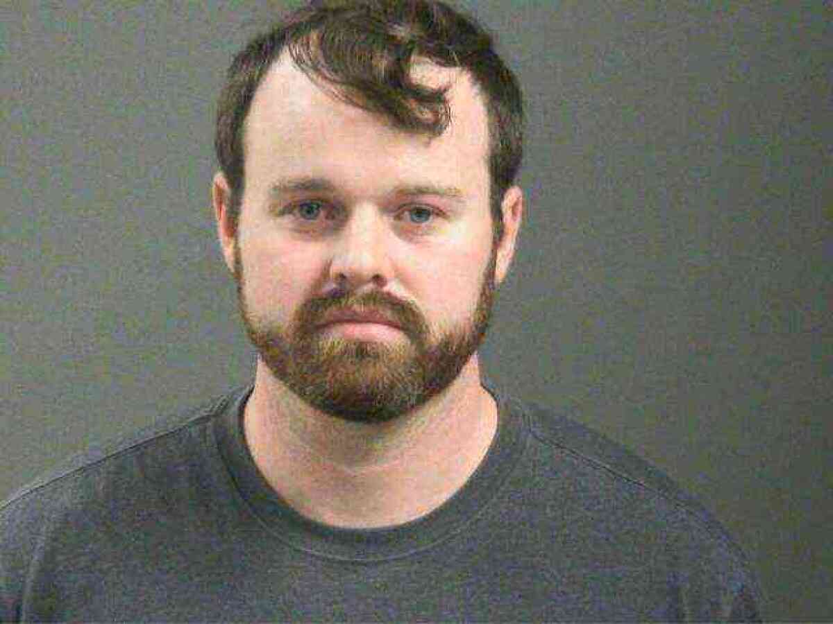 A booking photo of Joseph Duggar