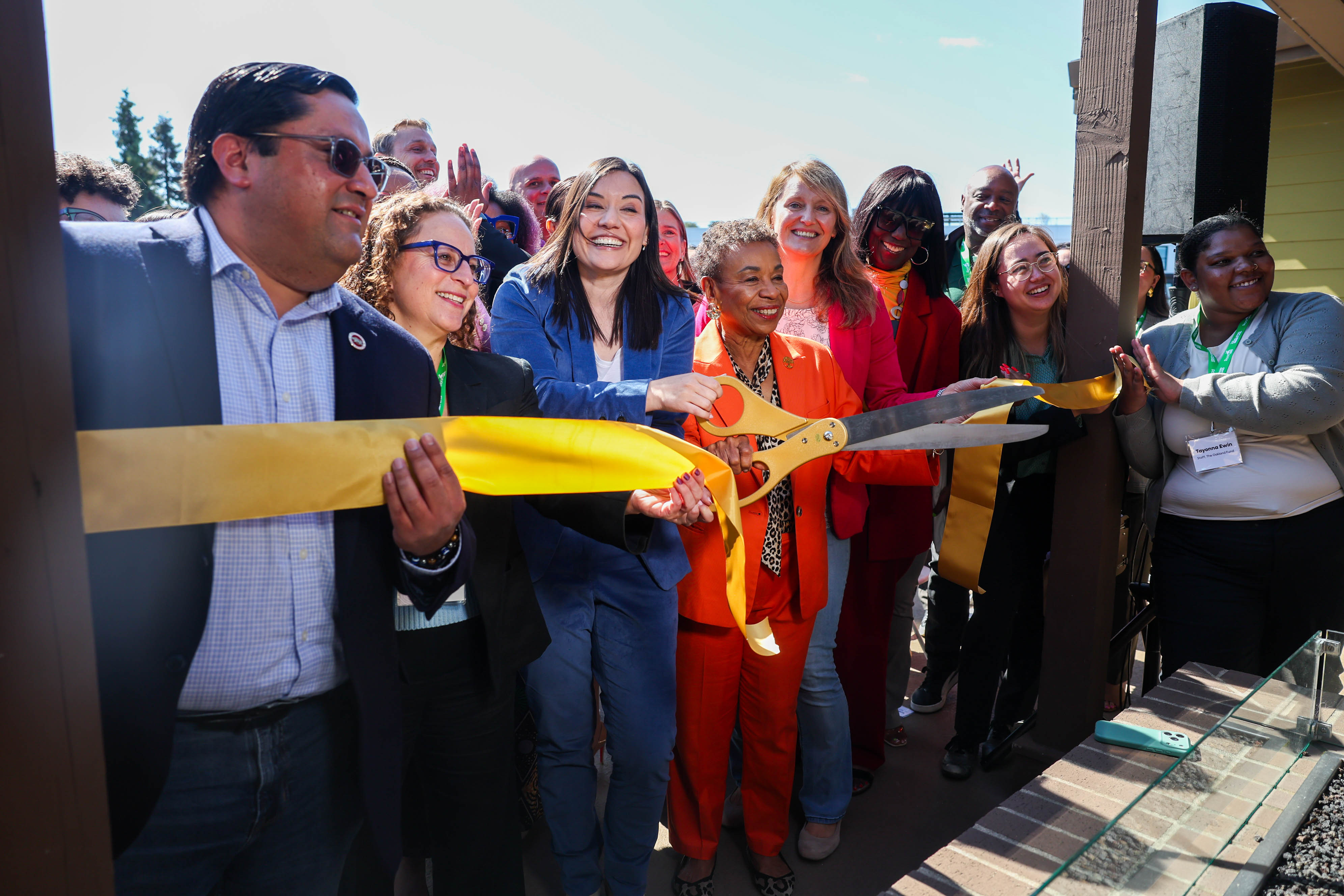 Sen. Jesse ArreguÃ­n, left, Oakland Fund CEO Kyra Mungia, center...