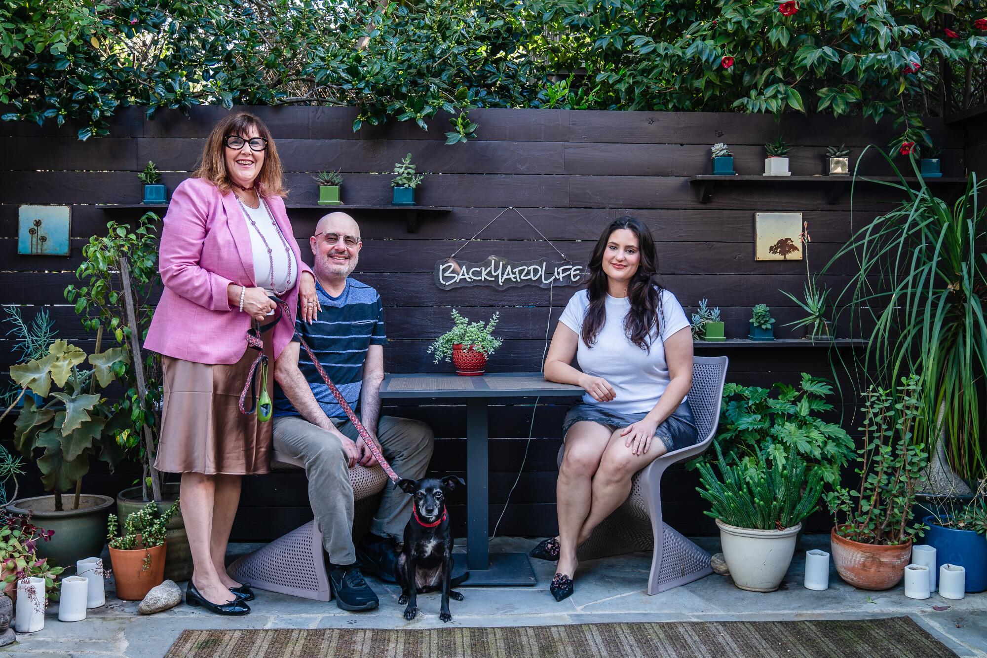 Tina LaMonica, Warren Wellen, their daughter Sophie Wellen and their dog Hazelnut.