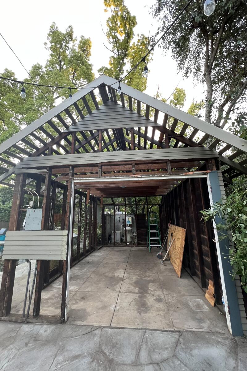 The garage before, left, during, right, and after, below, construction.