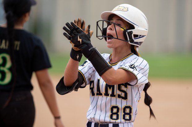 Millikan's Mia Meza reacts after singling in the third inning during a girl's softball game against Long Beach Poly at Millikan High School on Tuesday, March 31, 2026. (Photo by Scott Smeltzer/Contributing Photographer)