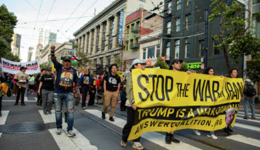Anti-war demonstrators march on Market Street in San Francisco