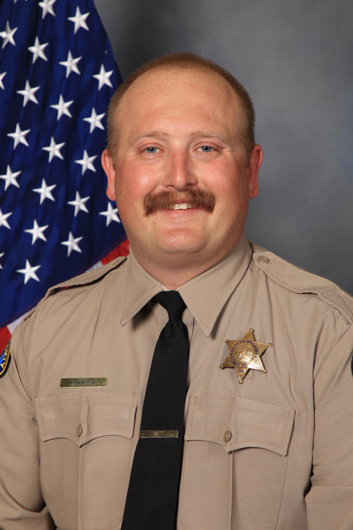 A sheriff's deputy in uniform