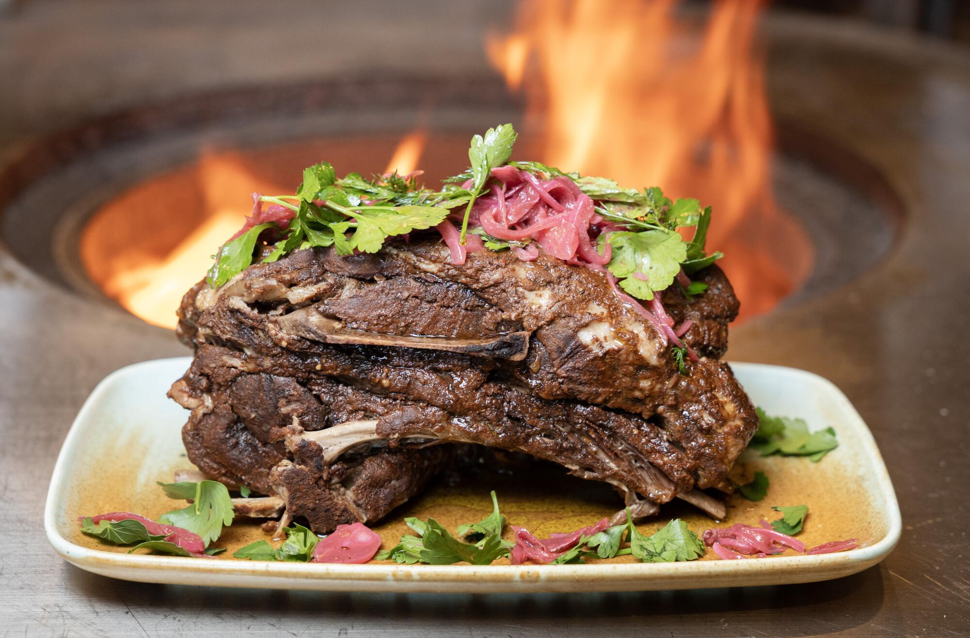 Lamb shoulder with Syrian seven spice, sumac, onions and herbs at Maydan Restaurant