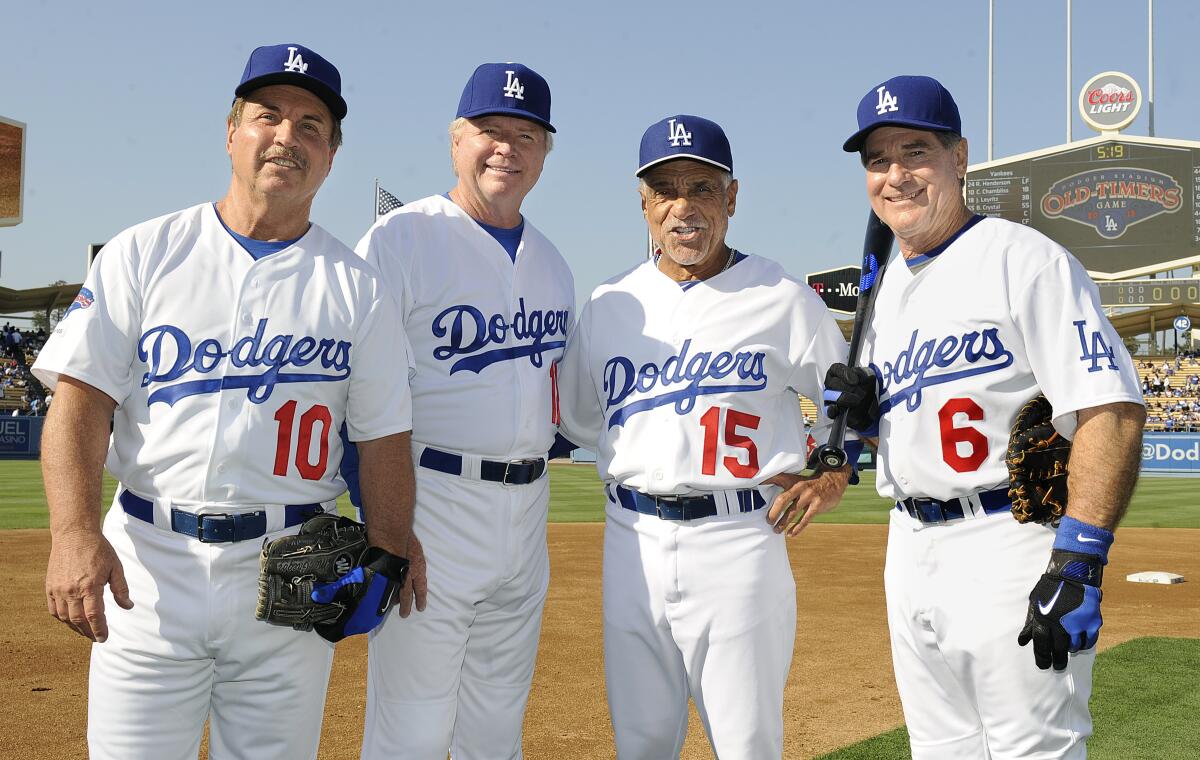 From left, Ron Cey, Bill Russell, Davey Lopes and Steve Garvey reunite in 2013.
