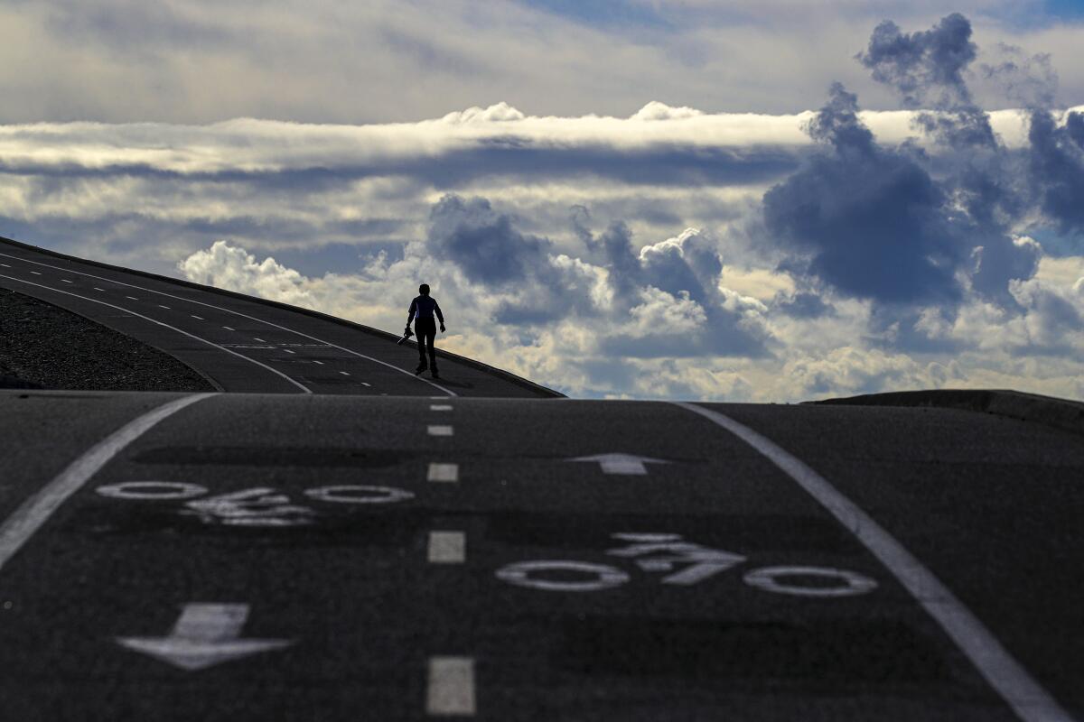 A rollerblader on San Gabriel River Bike Trail 