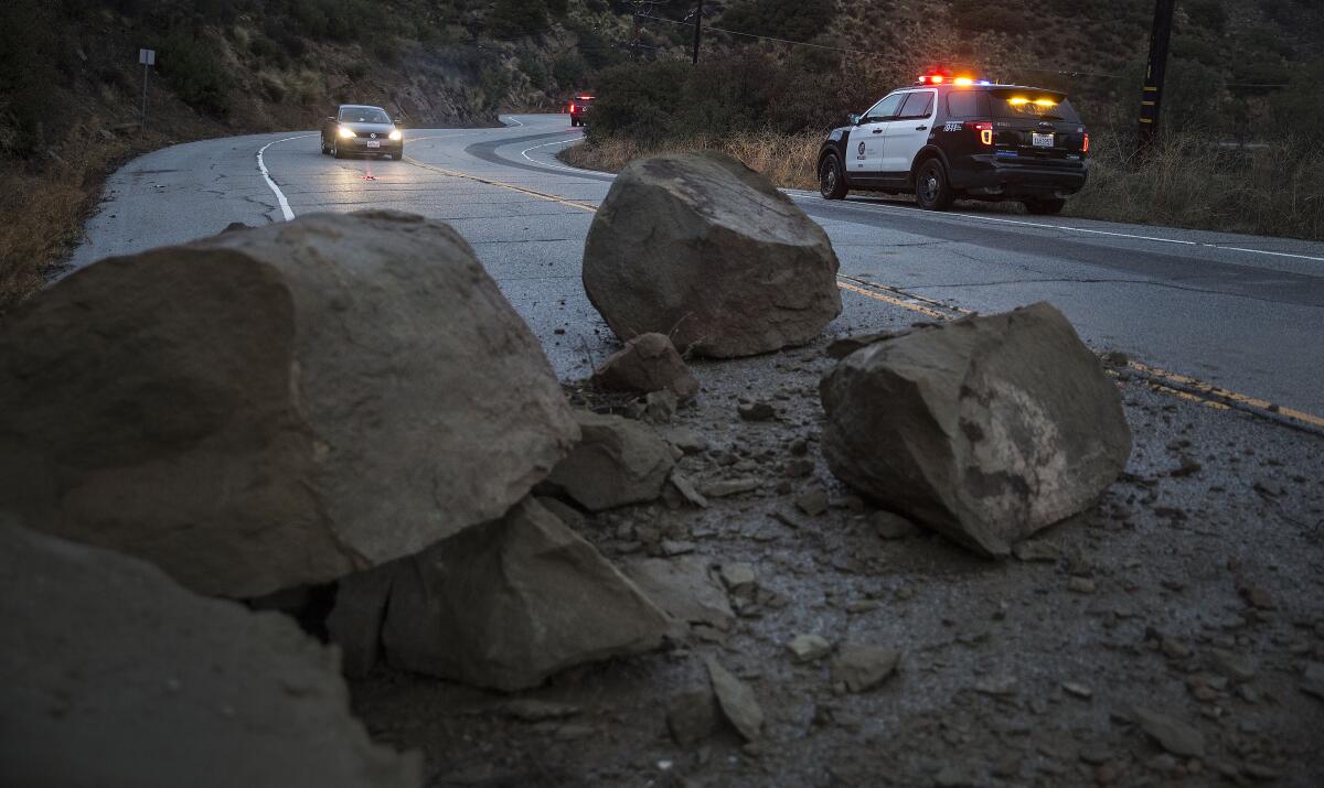 Large boulders on a road