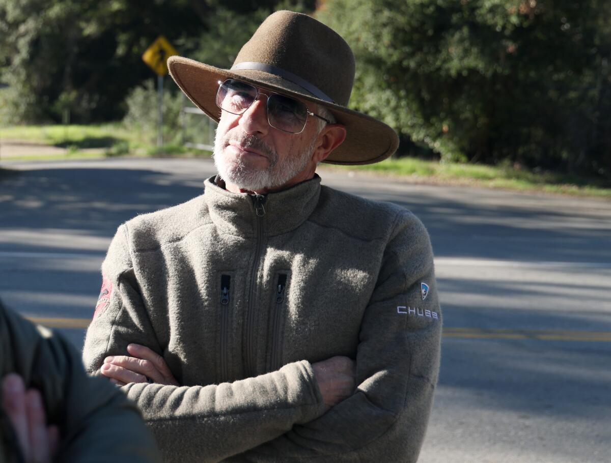 Doug Baron stands along Mulholland Highway in December.