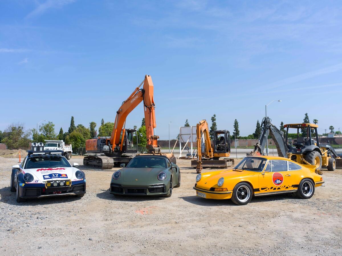 Classic and modern Porsches at the groundbreaking.