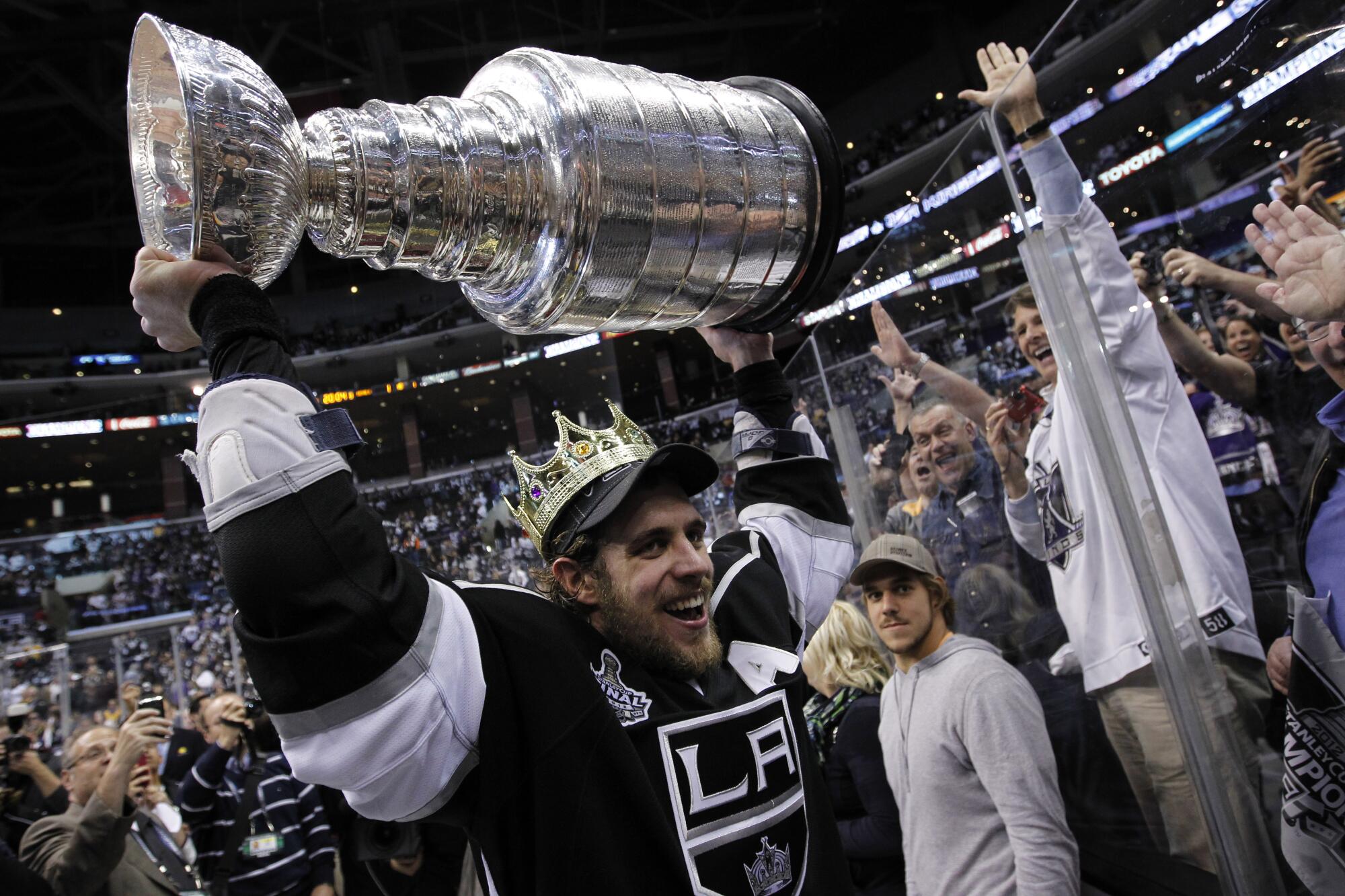 Anze Kopitar celebrates with the Stanley Cup after the Kings' win over the New Jersey Devils in 2012.