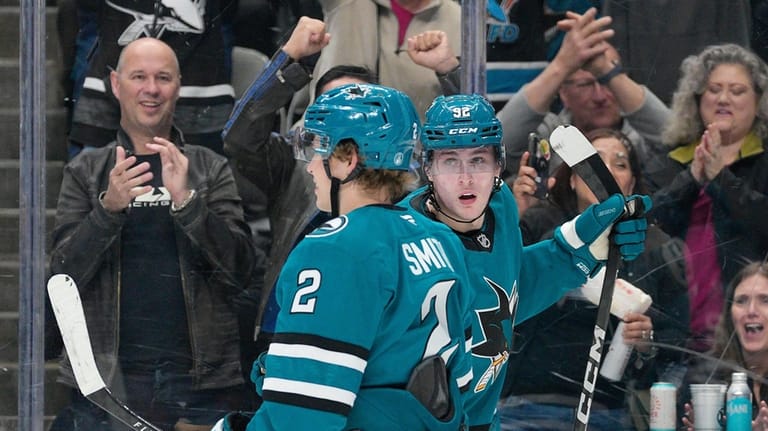 San Jose Sharks left wing Igor Chernyshov, right, celebrates with...