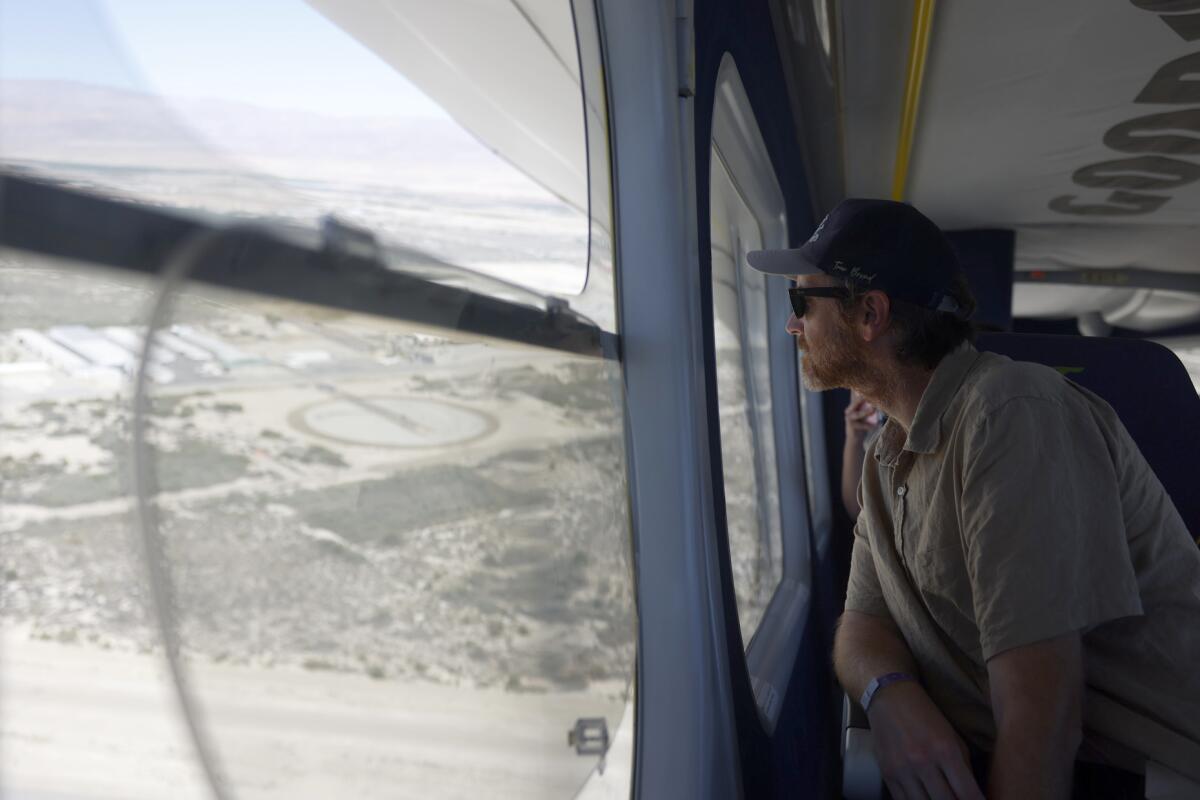 Los Angeles Times reporter Mikael Wood rides the Goodyear blimp flying over Coachella