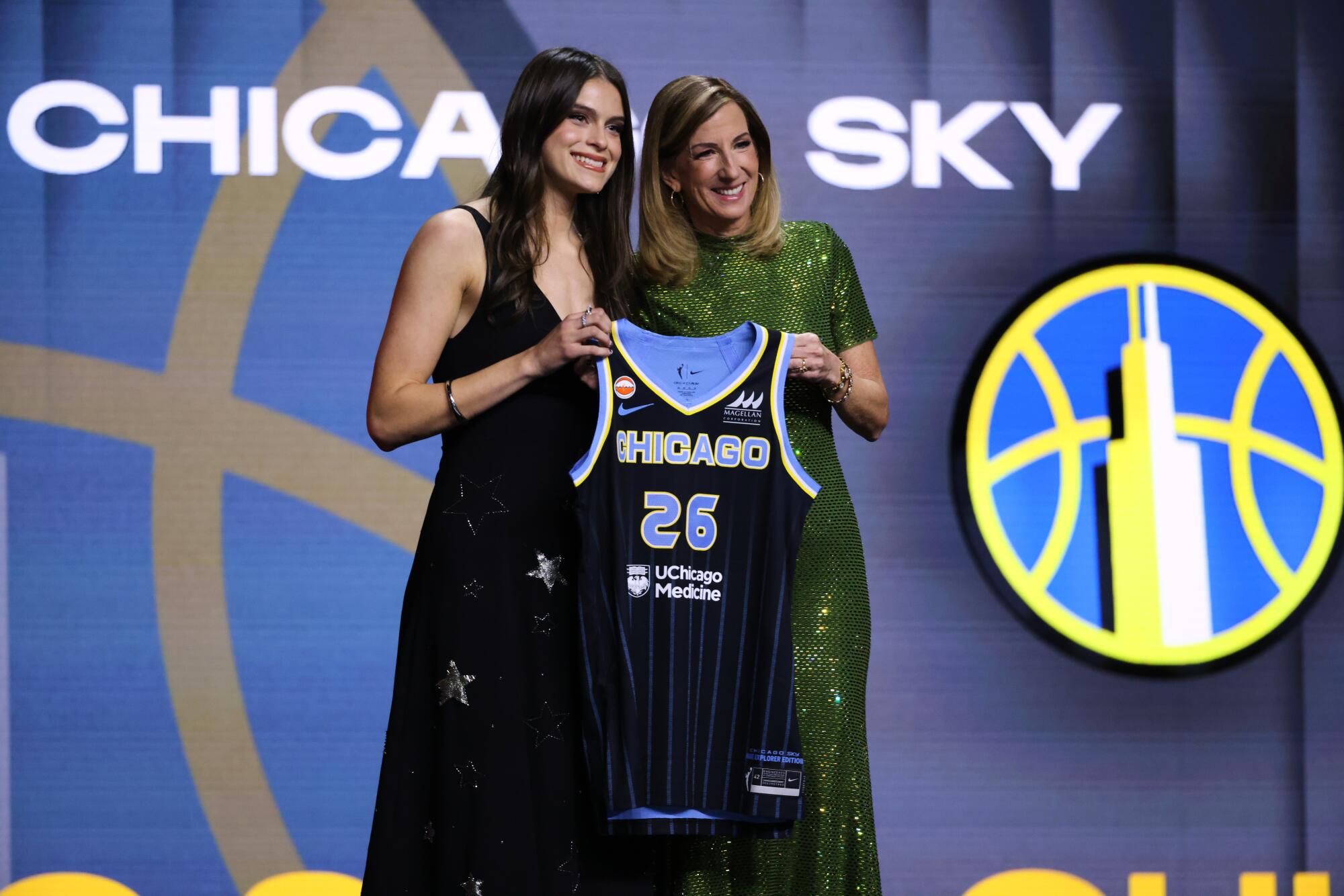 UCLA guard Gabriela Jaquez poses with WNBA commissioner Cathy Engelbert after being selected No. 5 by the Chicago Sky.