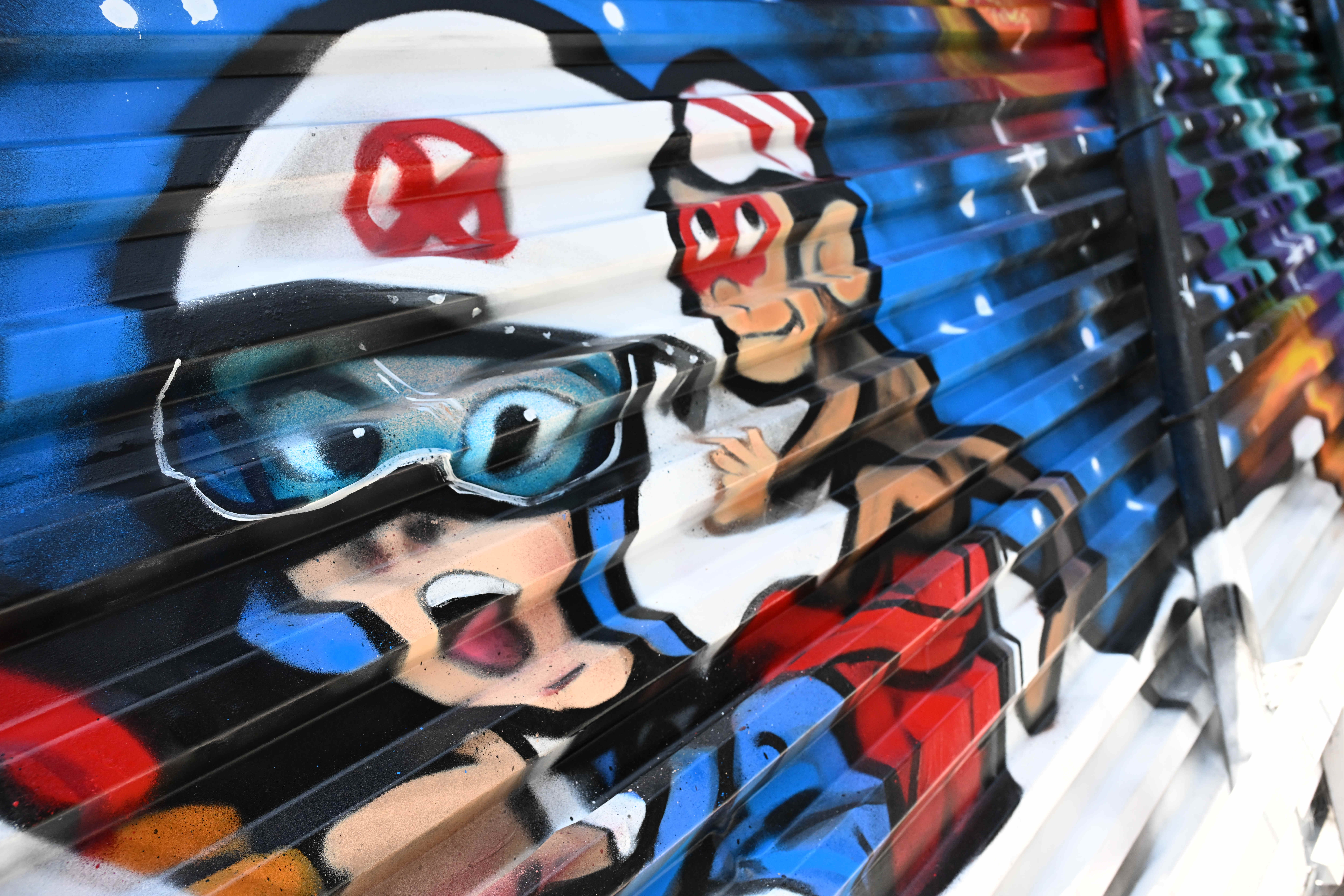Artist, Jose âDoomsâ Pedrozaâs mural of âSpeed Racerâ, photographed on...