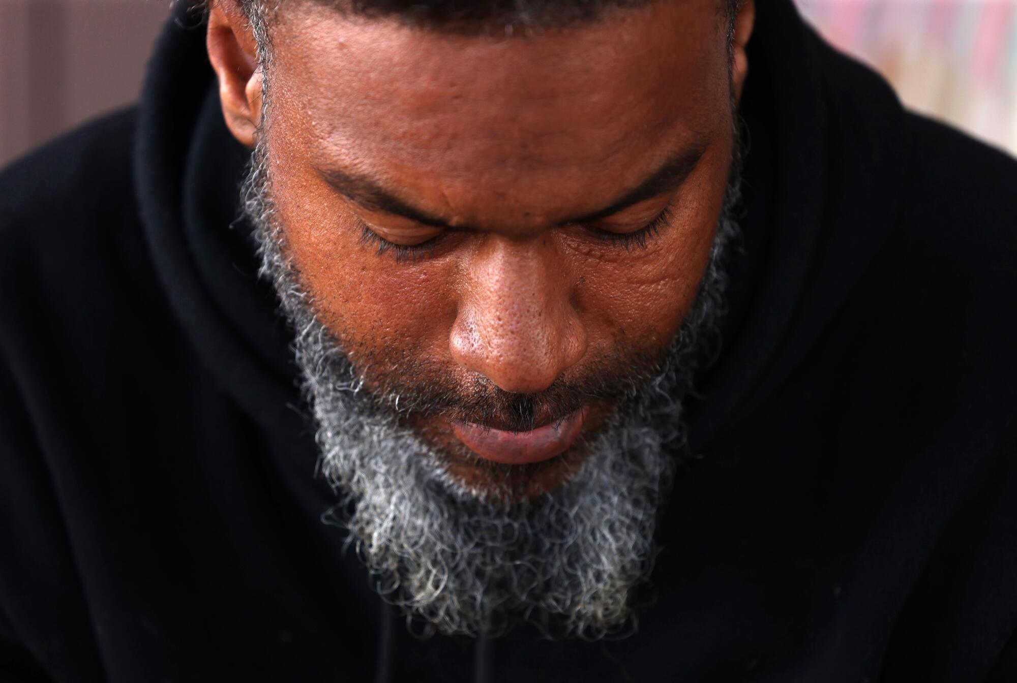 Clayton Green spends time across the street from a homeless shelter.