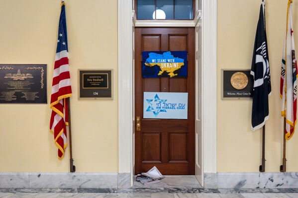 The entrance to the office of Rep. Eric Swalwell, D-Calif., is seen on Capitol Hill in Washington, Monday, April 13, 2026. (AP Photo/J. Scott Applewhite)