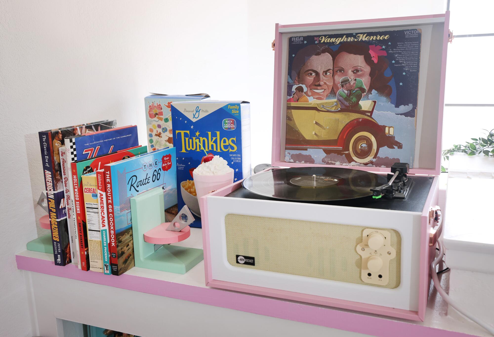 Colorful books and a record player in the diner 