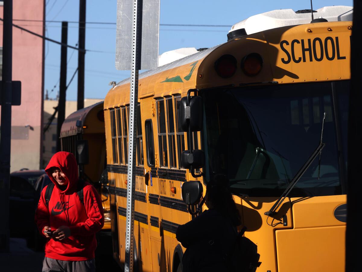 A student arrives for class at Miguel Contreras Learning Complex after an LAUSD strike is averted on Tuesday.