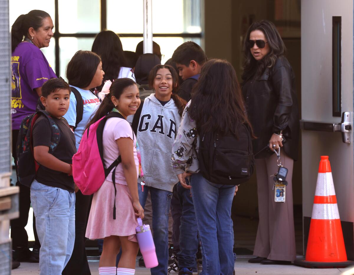 Faculty members and students on campus