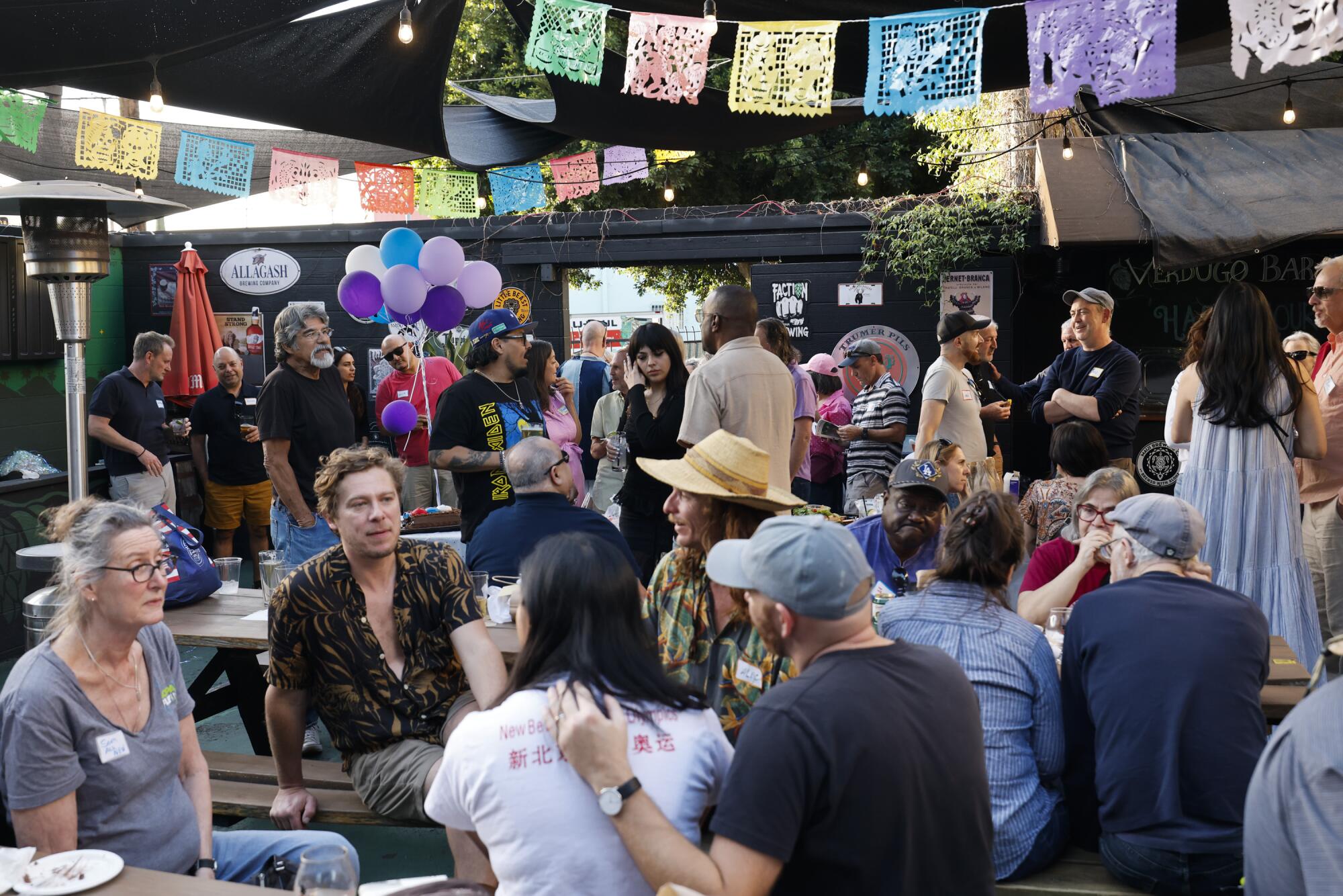 Two hundred residents attended John Ayala's retirement party after 40 years with the USPS.