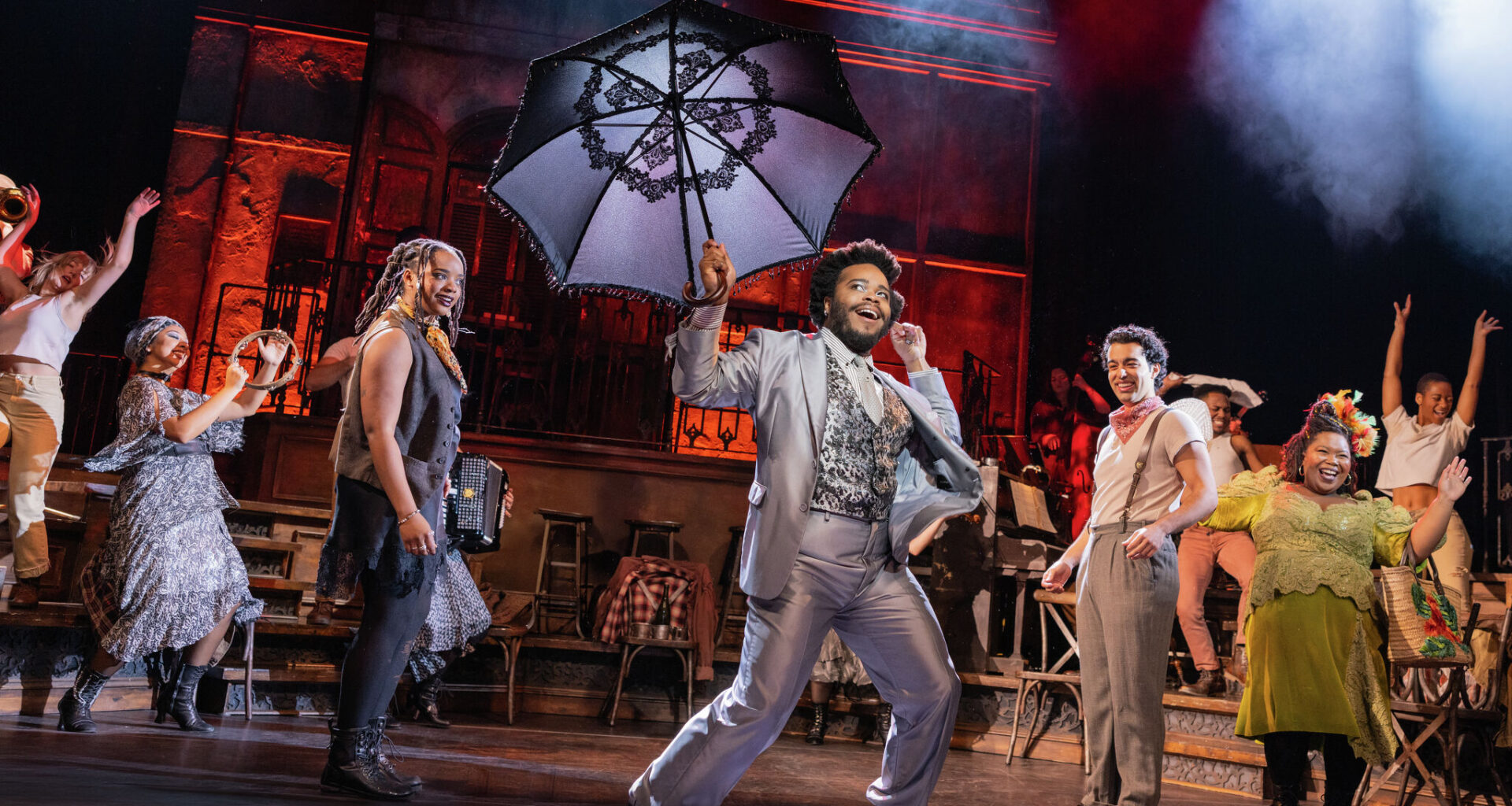 Rudy Foster as Hermes and the cast of “Hadestown,” which tours to ATG San Francisco’s Orpheum Theatre.