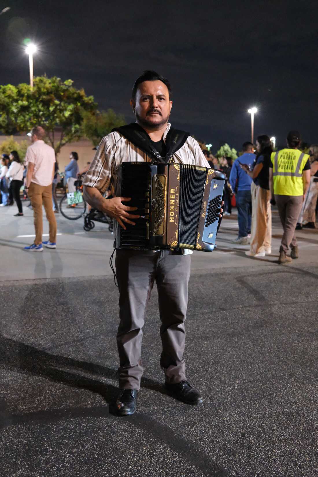 Band director Omar Leon is a community organizer and former day laborer, as are most of the band's members. He's also the its songwriter and plays the accordion and keyboard.