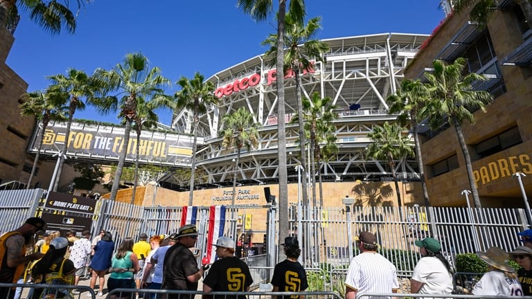 Fans line-up at Petco Park for an opening-day baseball game...