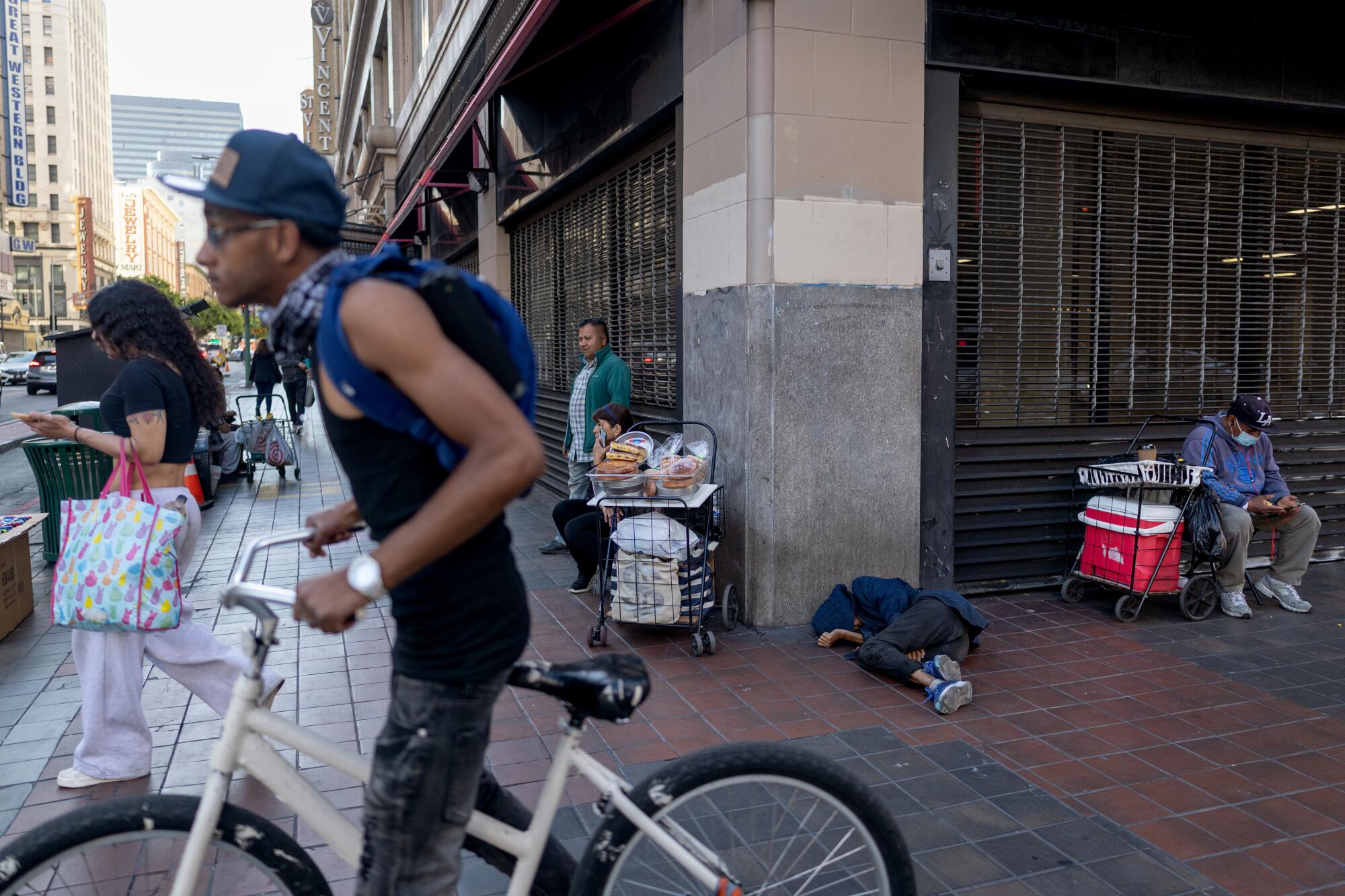 Storefronts are gated up due to vandalism in the historic district in downtown Los Angeles on Tuesday.
