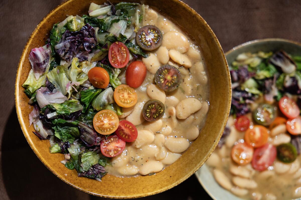 EL SEGUNDO, CA - MARCH 10 2026: Lima beans with bitter greens by Michelle Huneven at the Los Angeles Times Test Kitchen