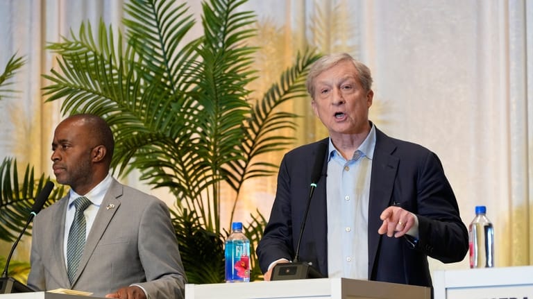 Tom Steyer, right, speaks beside Tony Thurmond during a gubernatorial...