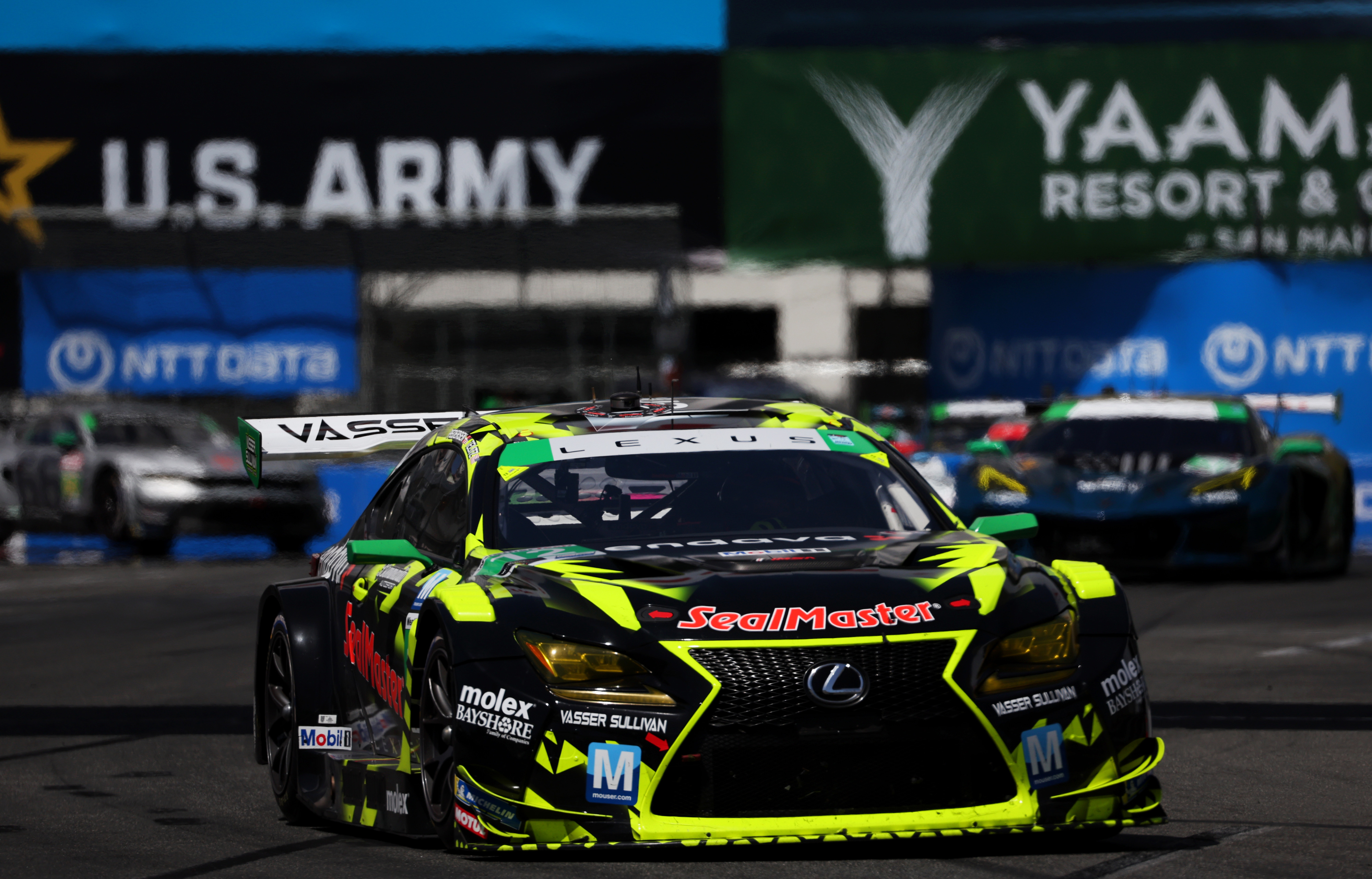 The Vasser Sullivan Racing (12) car leads the GTD field...