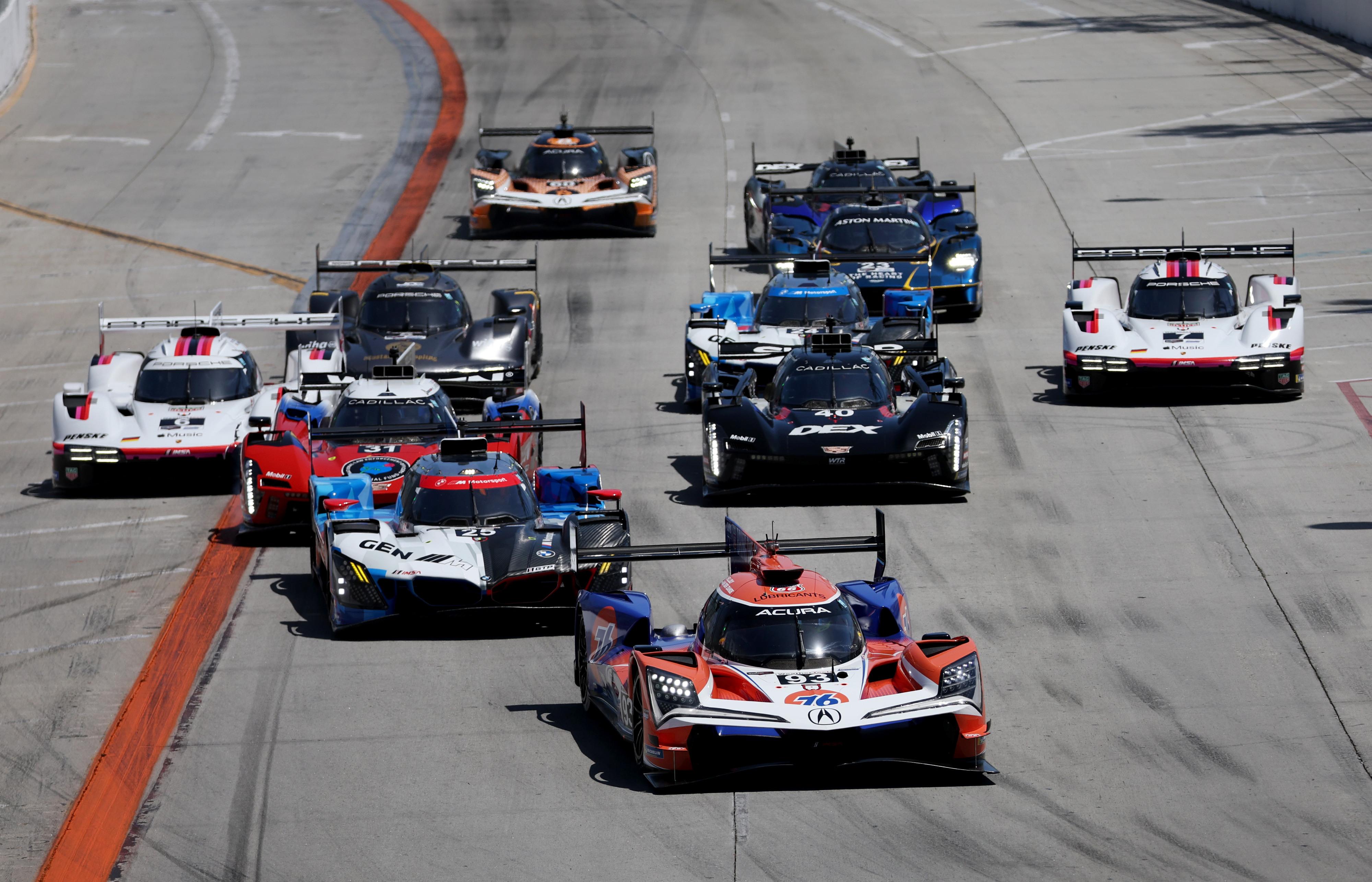 The Acura Meyer Shank Racing GTP car (93) leads the...