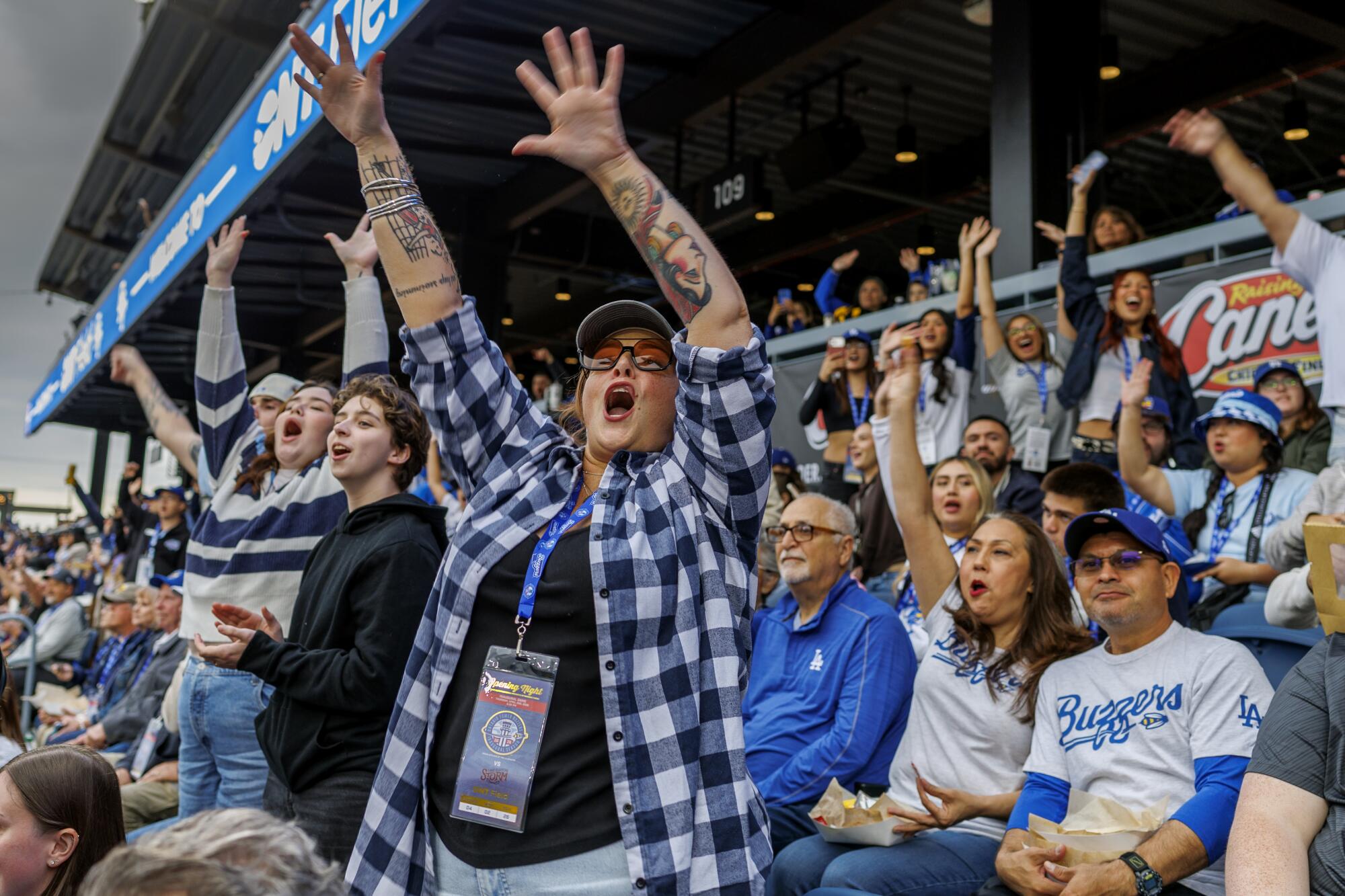 Tracy Monte of Oregon cheers during the opening ceremonies.