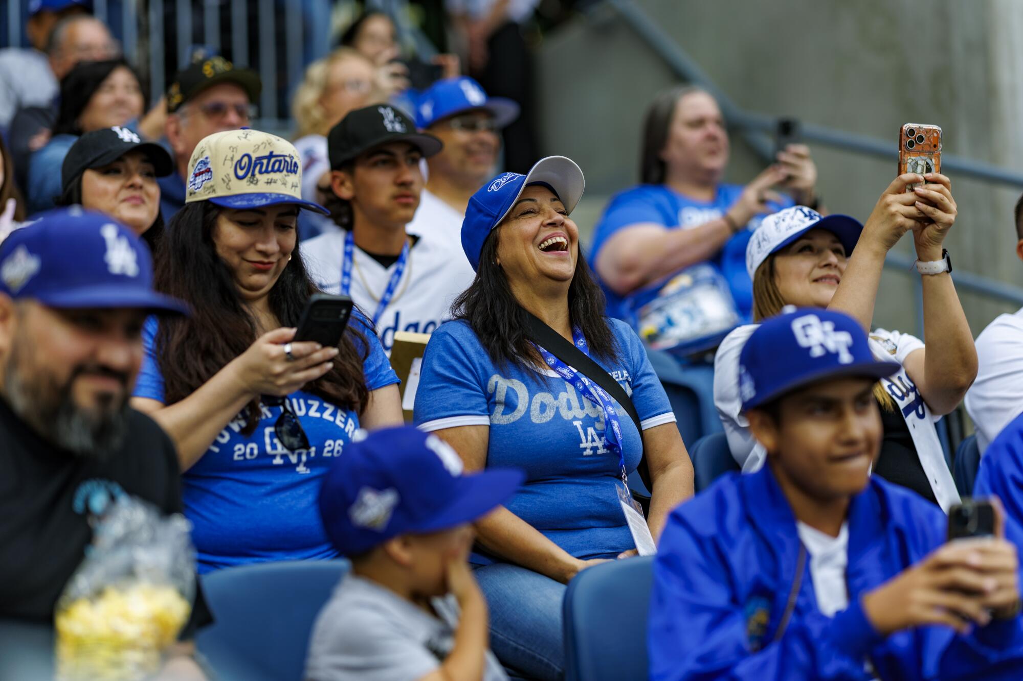 Fans sport their Dodgers gear at the opening game for the Ontario Tower Buzzers.