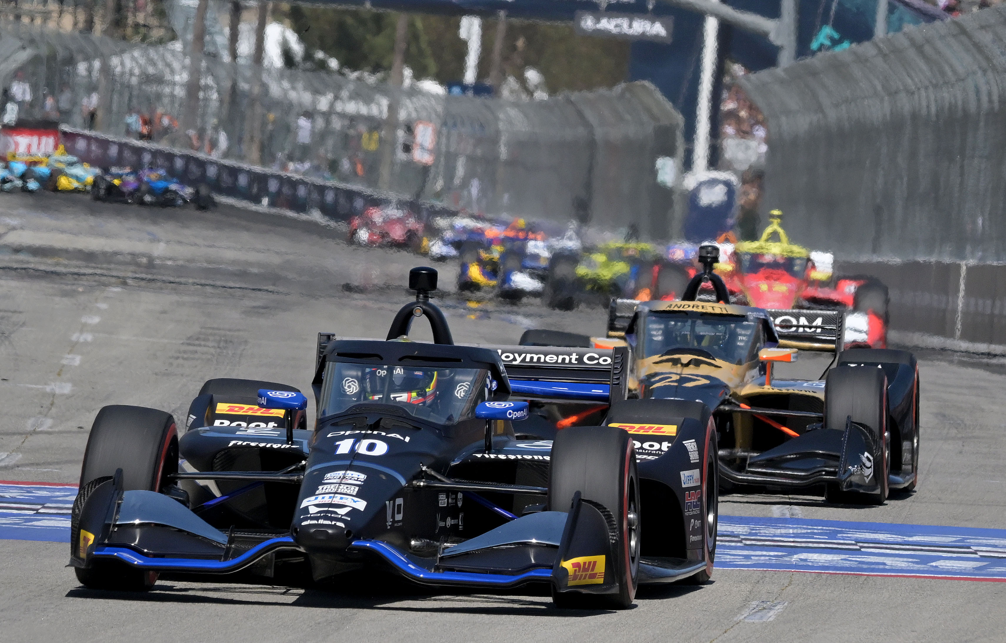 Indycar driver Alex Palou races down Shoreline Drive during the...