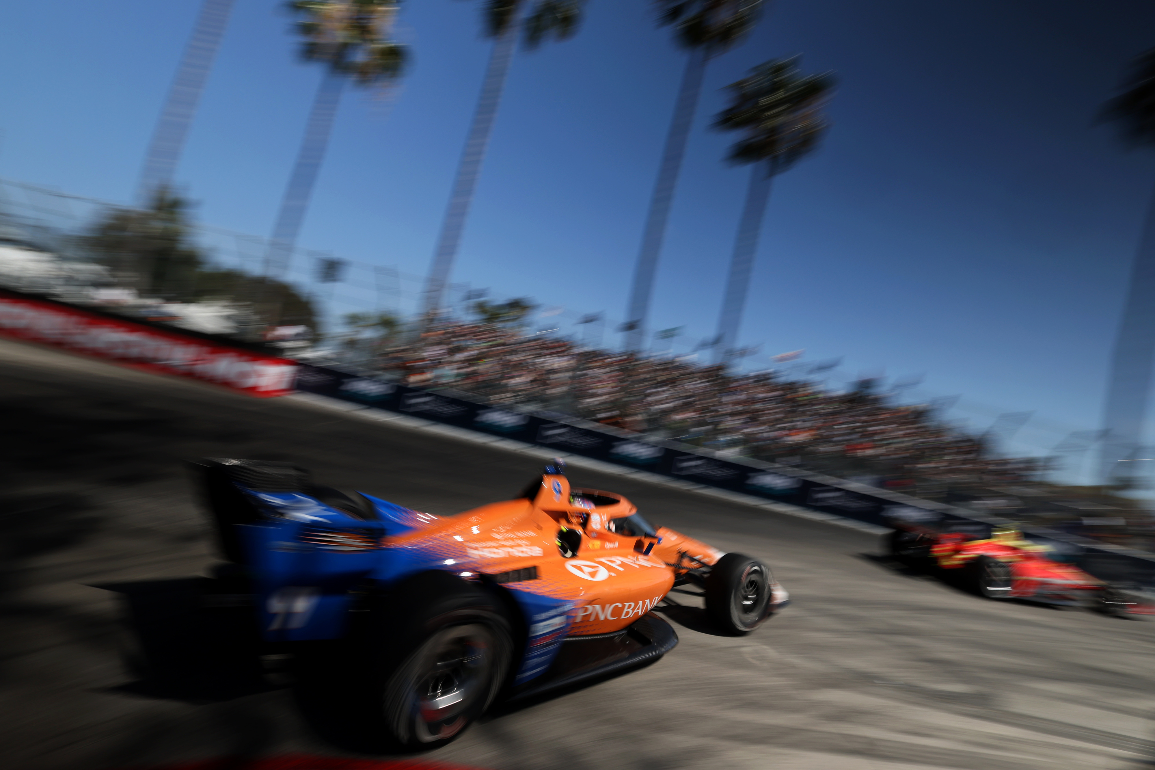 Indycar driver Scott Dixon hustles out of turn 11 during...