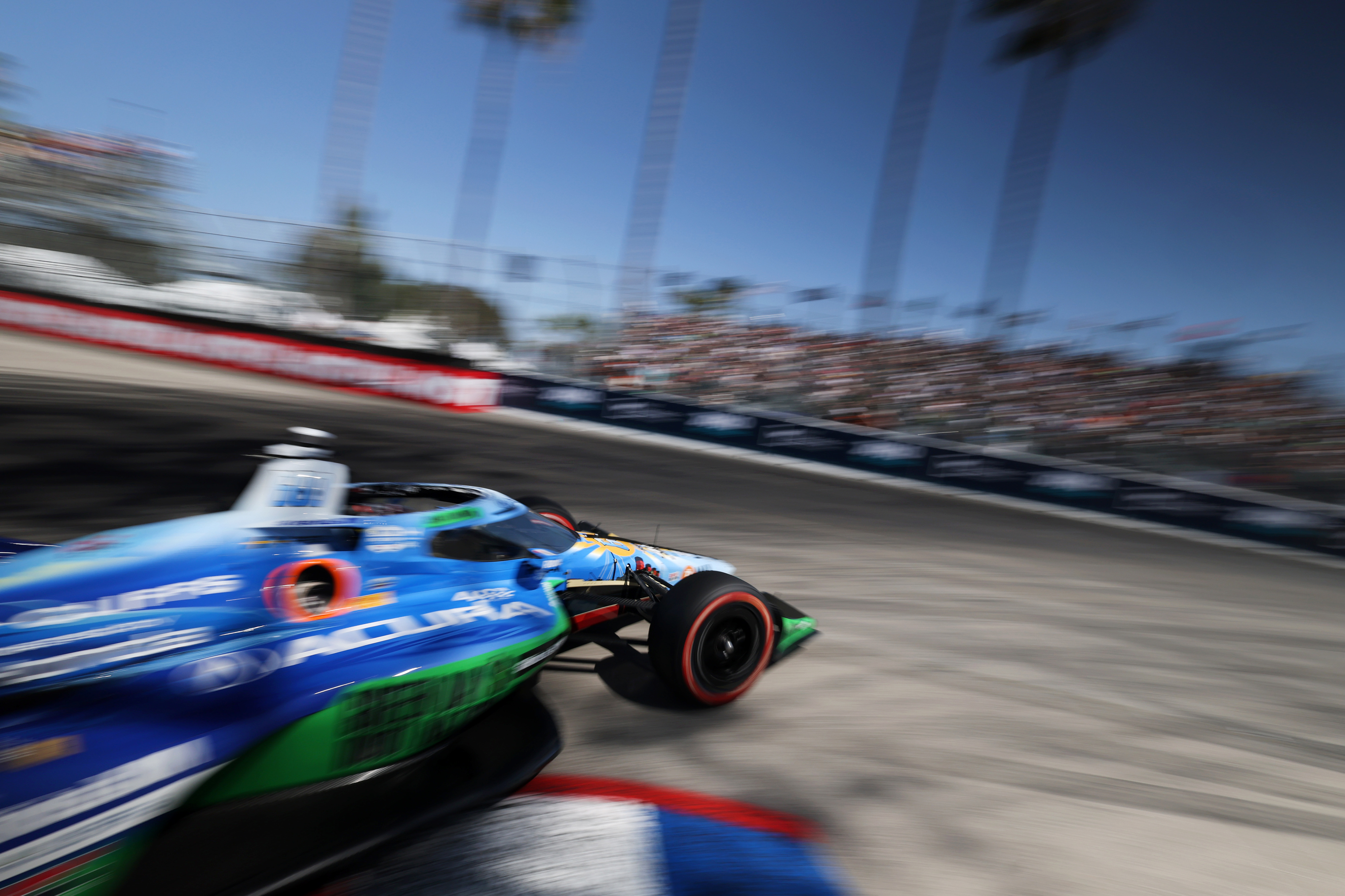 Indycar driver Felix Rosenqvist speeds out of turn 11 during...