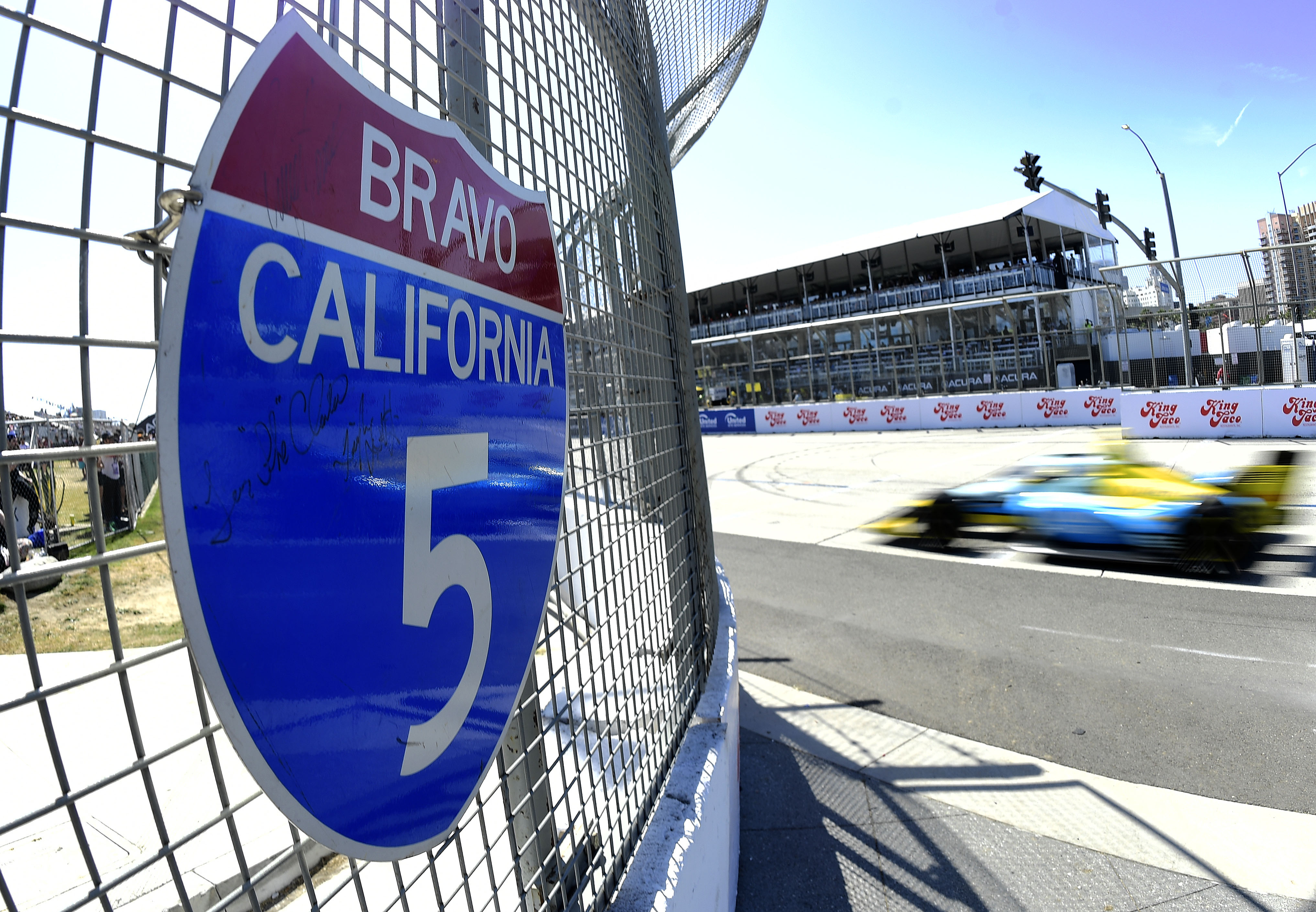 An Indycar driver races down Shoreline Drive during the 51st...