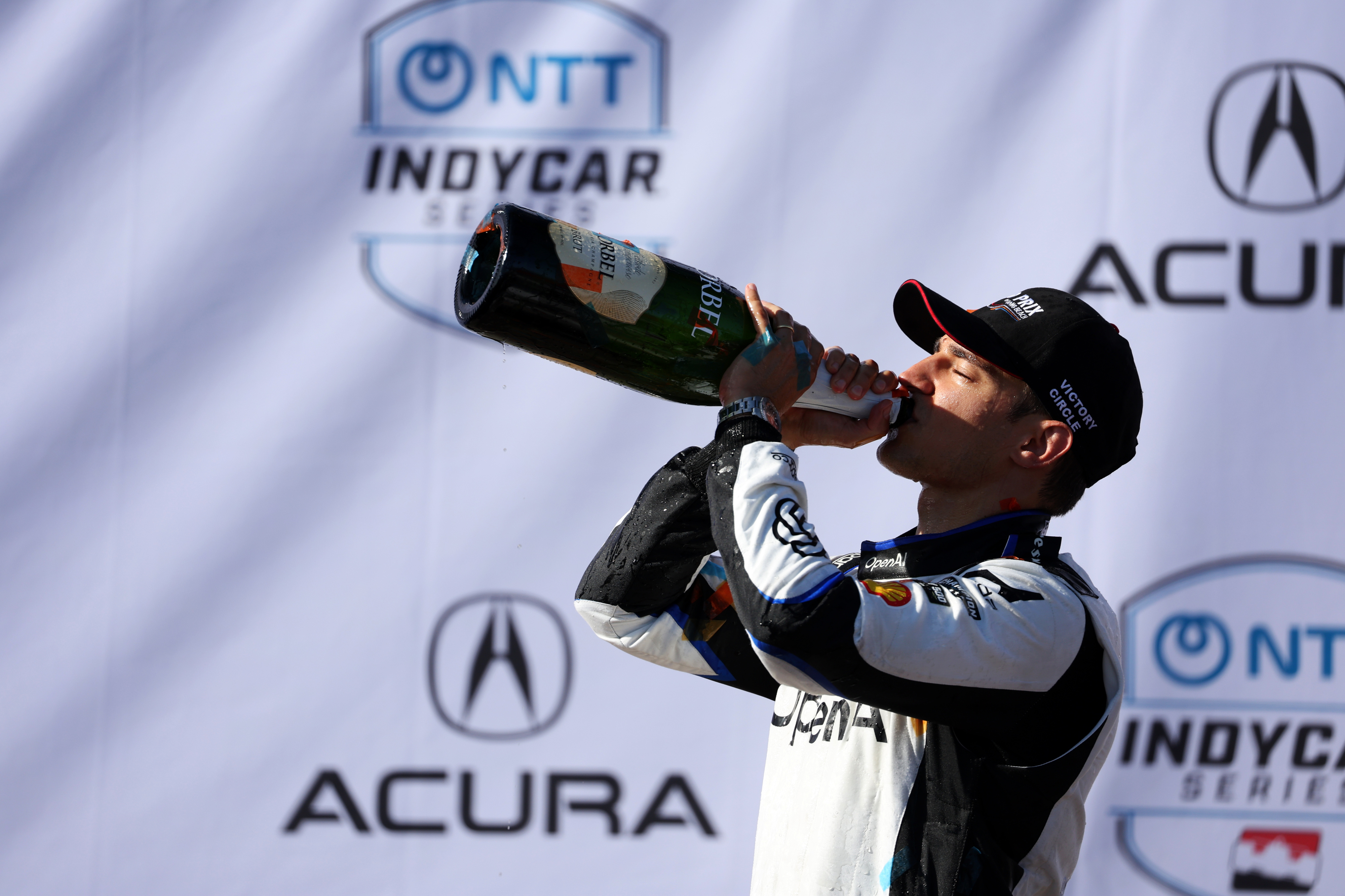 Indycar driver Alex Palou celebrates after winning the 51st Grand...
