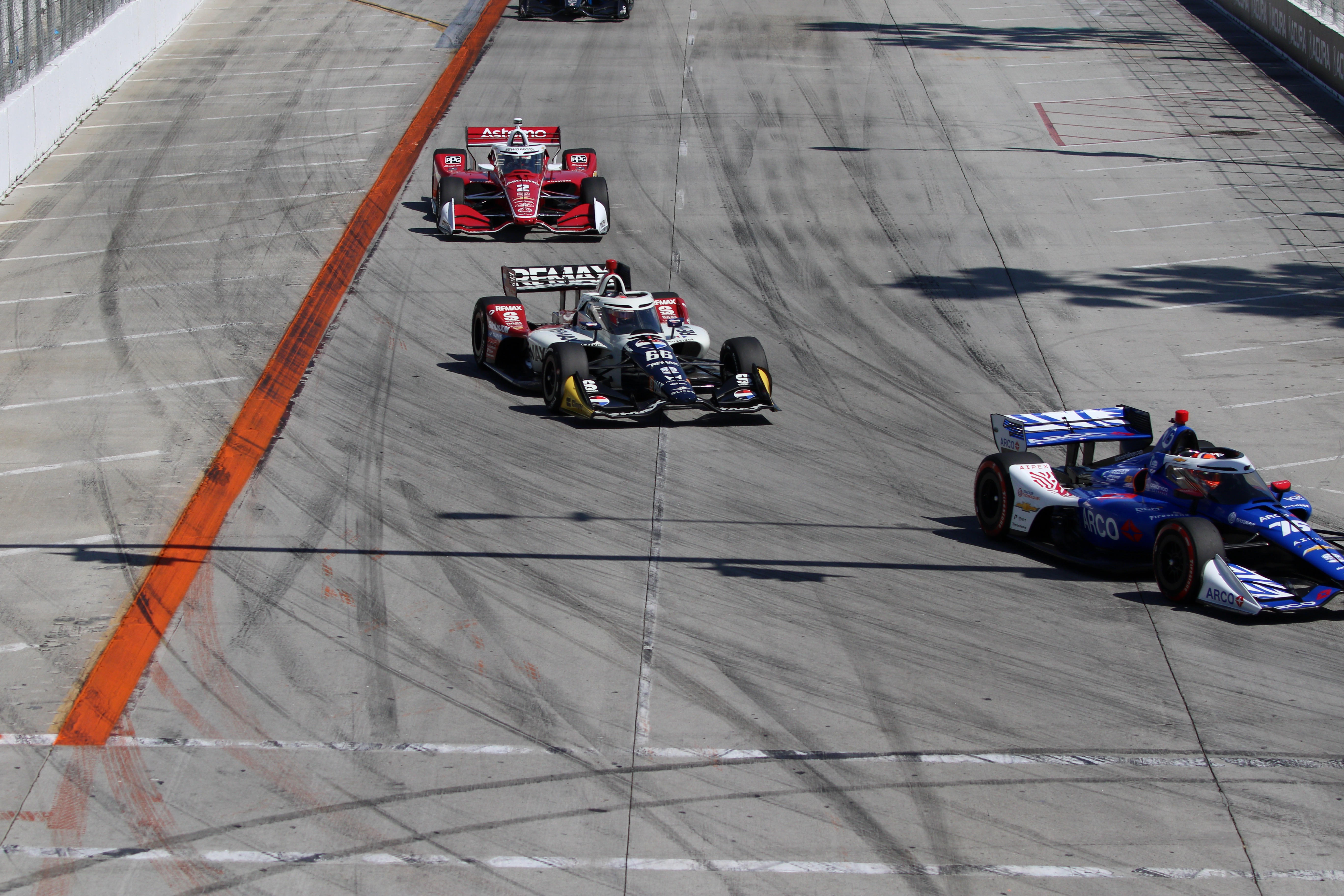 IndyCars make the first turn off Shoreline Drive during the...
