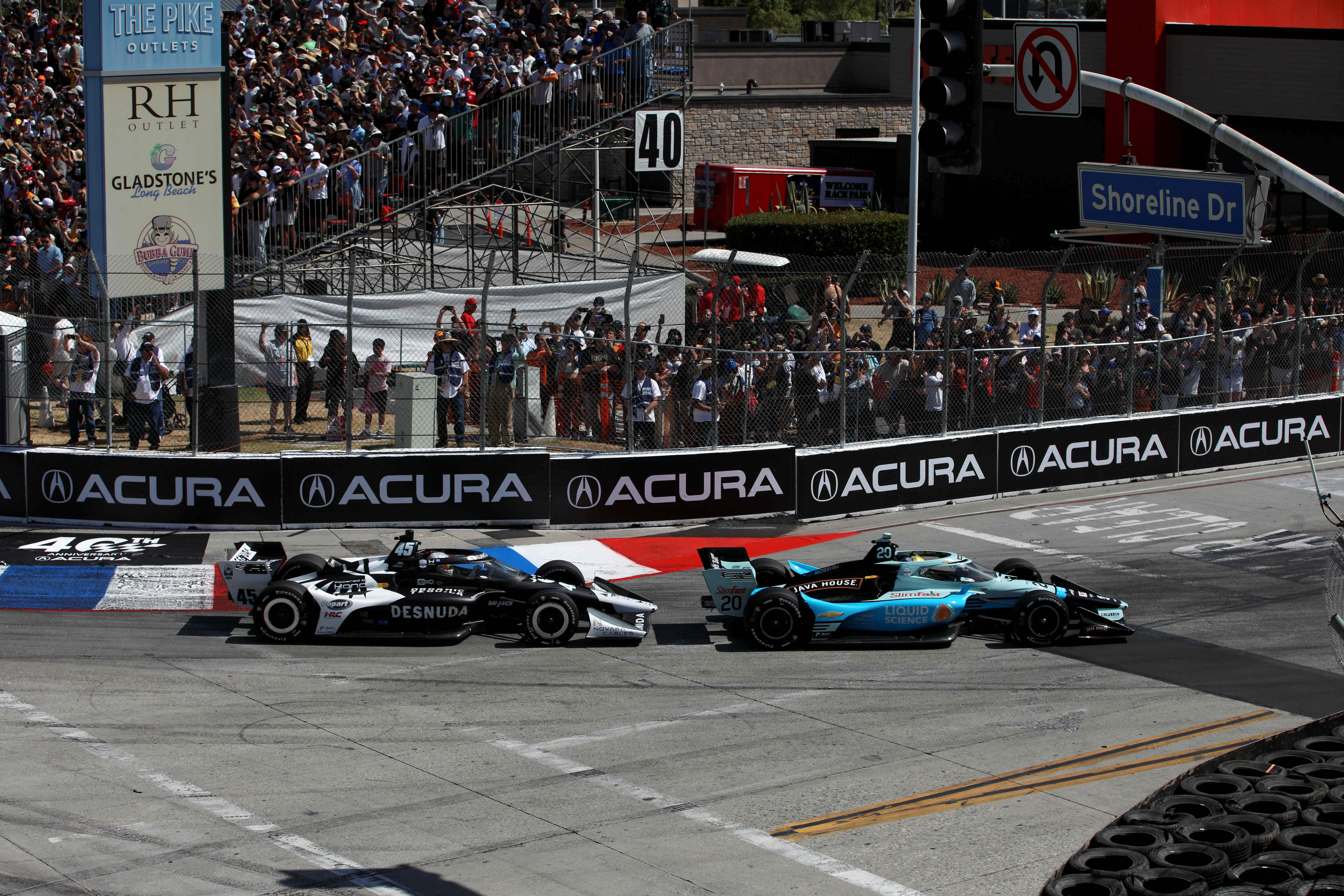 IndyCars make the first turn off Shoreline Drive during the...
