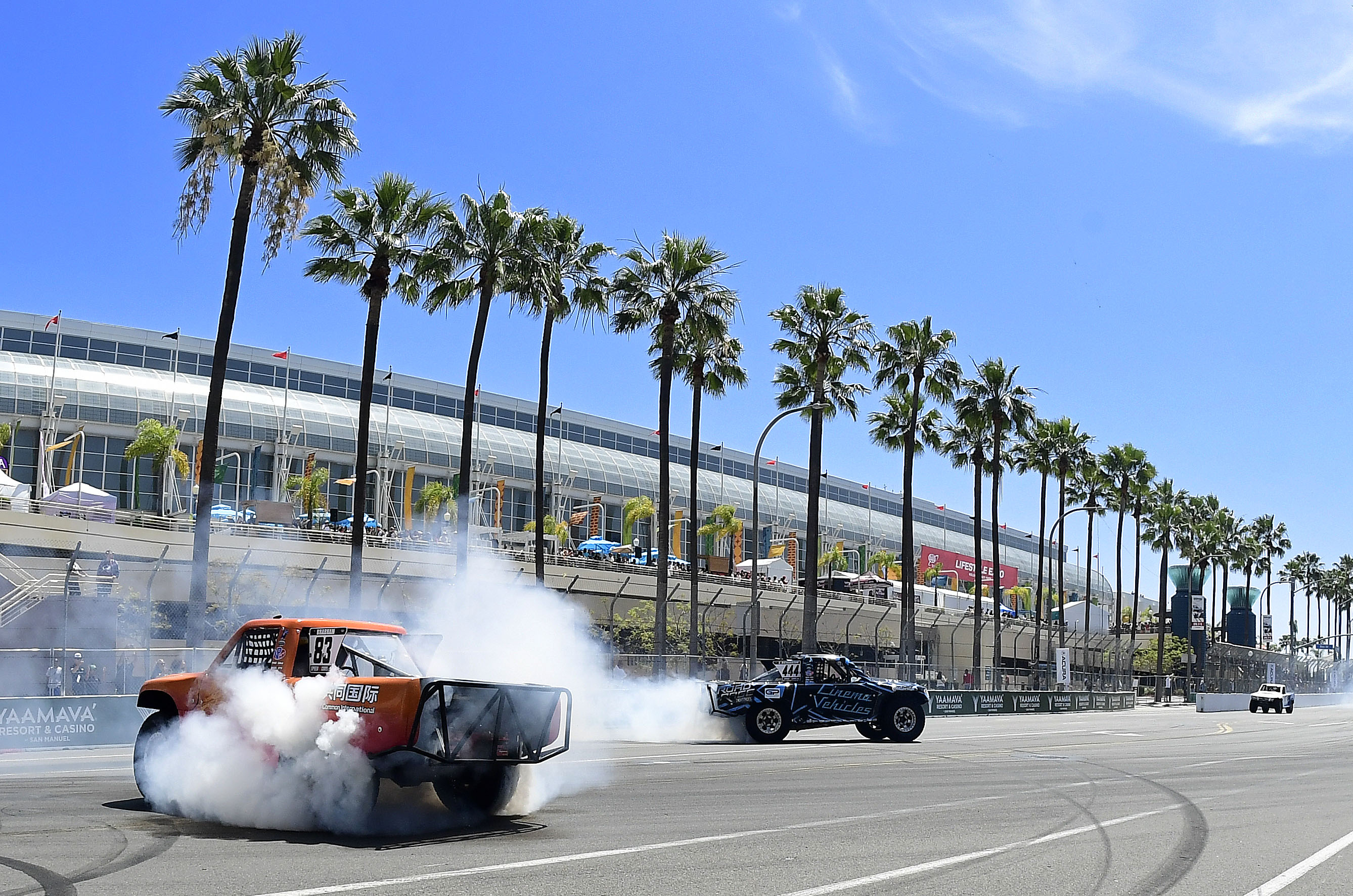 Stadium Super Trucks driver and race winner Matt Brabham, left,...