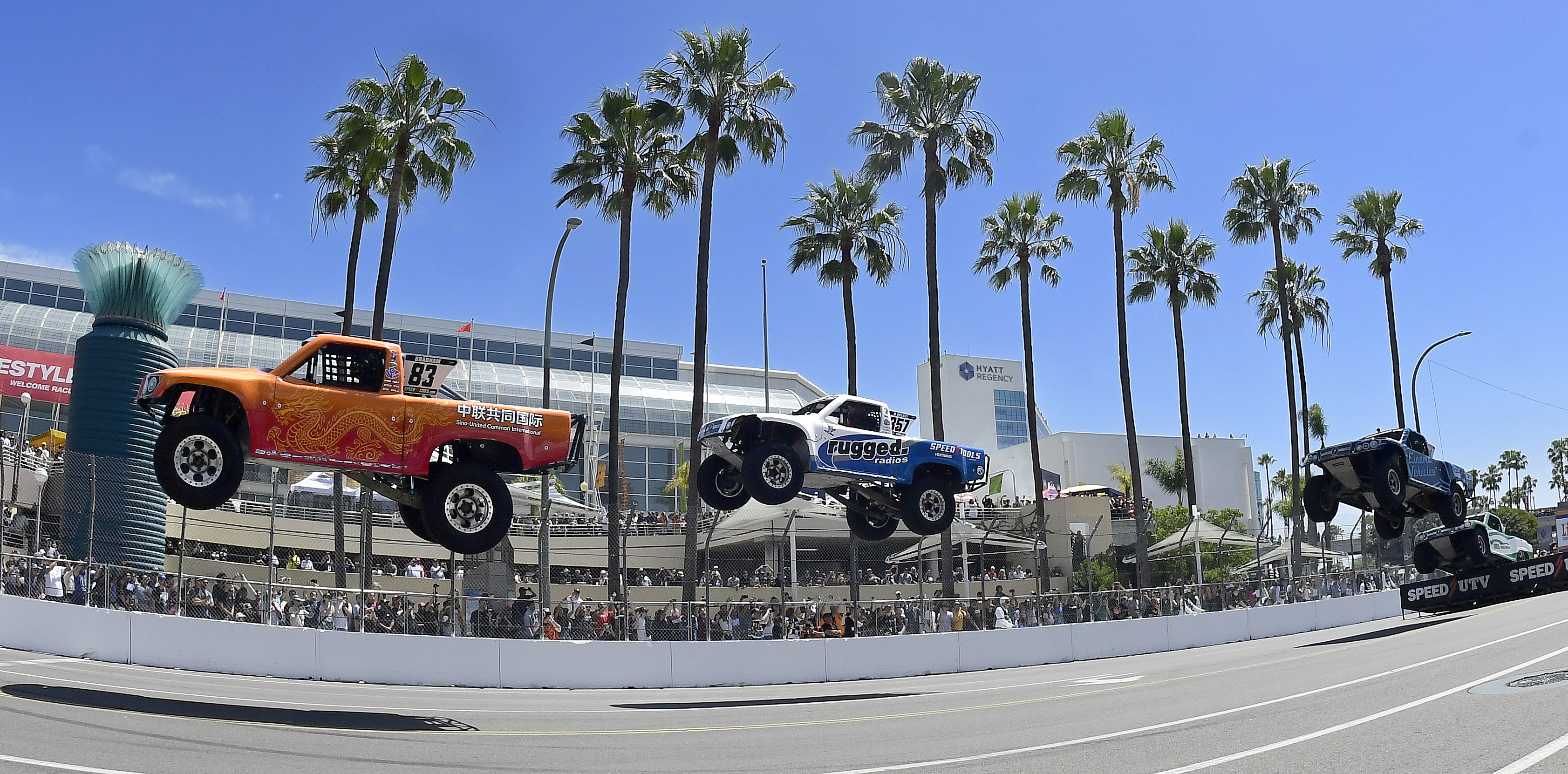 Stadium Super Trucks driver Matt Brabham leads Blake Wilkey during...
