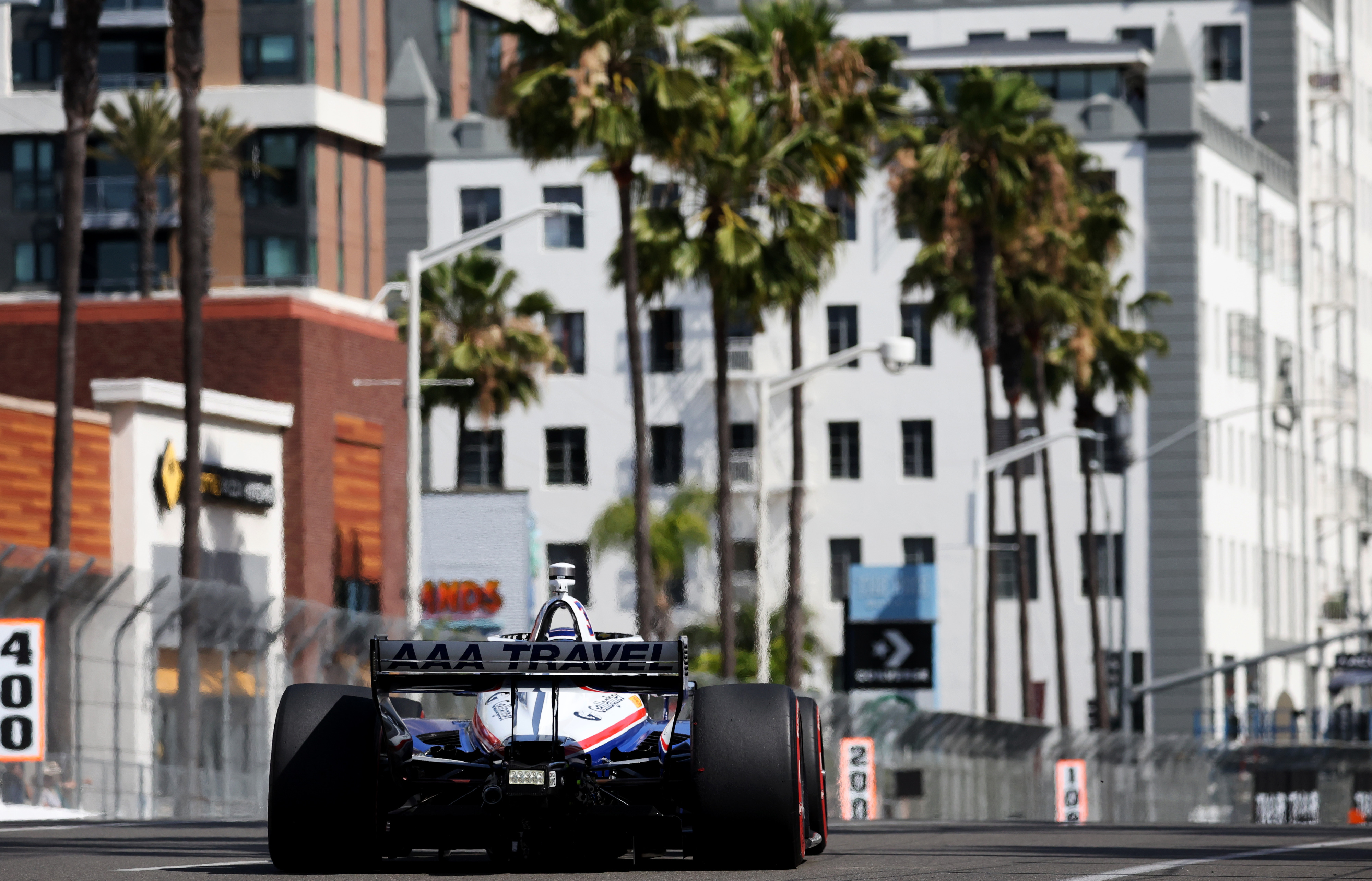 Indycar driver Scott McLaughlin speeds through the track in a...
