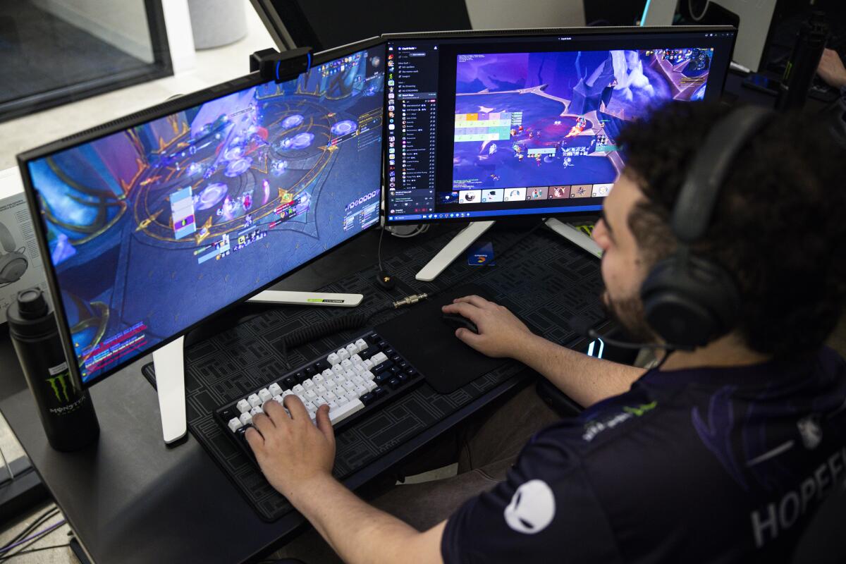 An esports competitor plays "World of Warcraft."