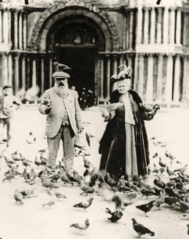 XIR175169 Claude Monet and his wife, Alice, St. Mark's Square, Venice, October 1908 (b/w photo) by French Photographer, (20th century); Musee Marmottan Monet, Paris, France.